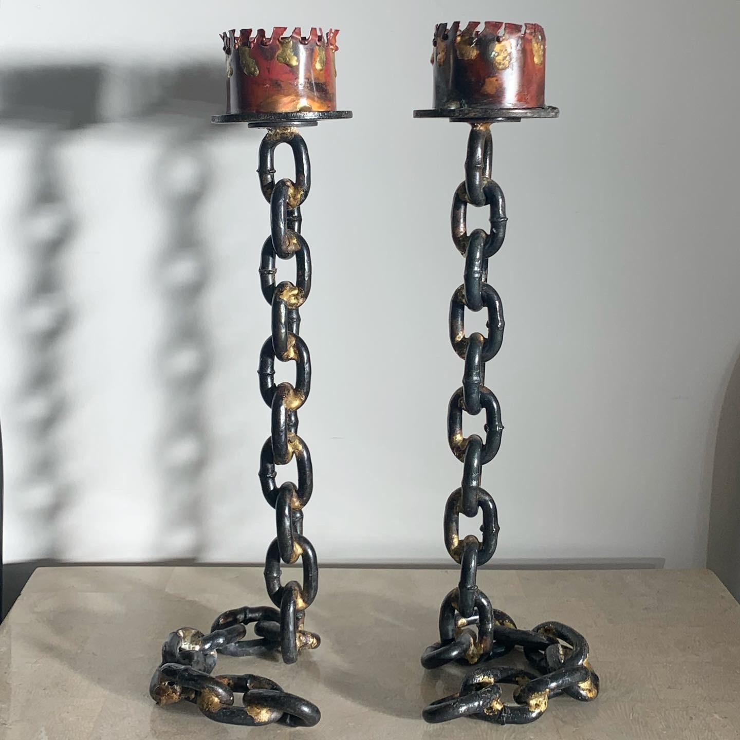 Iconic 1970s vintage welded cast iron chain candleholders. This design was definitely the 70s-does-Gothic look that began in France and eventually spawned the whole dark shadows fever / culture. High end, heavy. Each holds about a 2-2.5” block