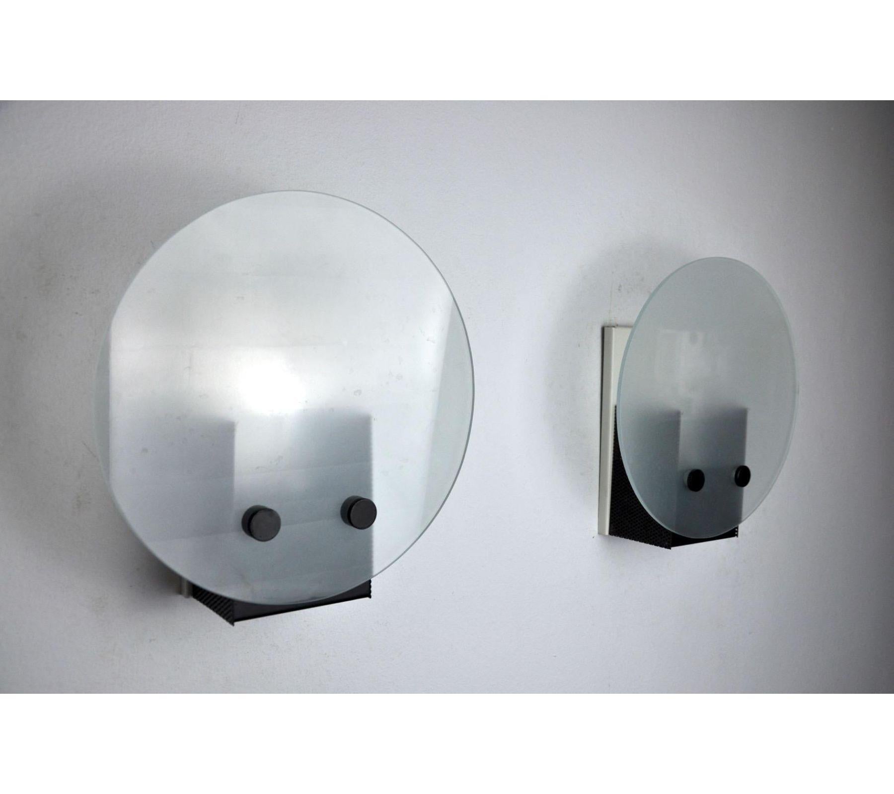Very pair of wall lamps in the memphis style, designated and produced in spain in the 1970s. Smoked glass and metal structure. Unique object that will illuminate and bring a real design touch to your interior. Electricity verified, time mark