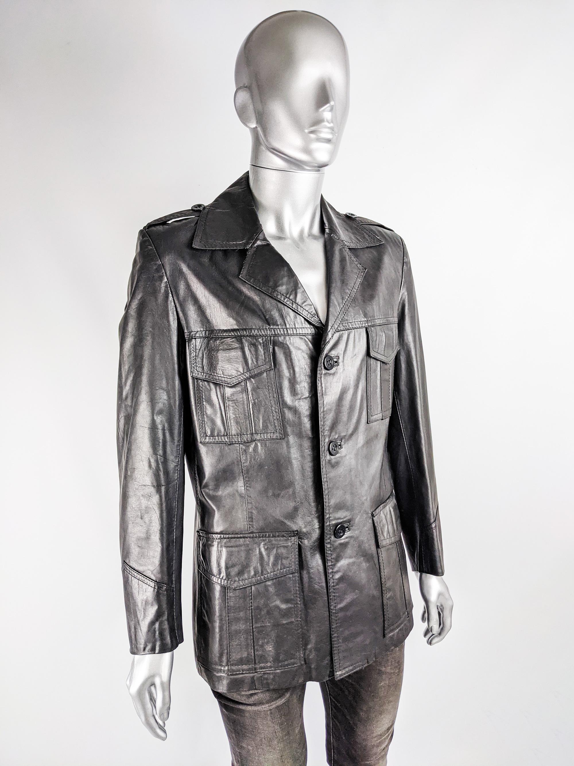 A stylish vintage mens leather jacket from the 70s by quality British label, Toff of London. In a black leather with pleated flap patch pockets, epaulettes and a spread collar. 

Size: Marked UK 40