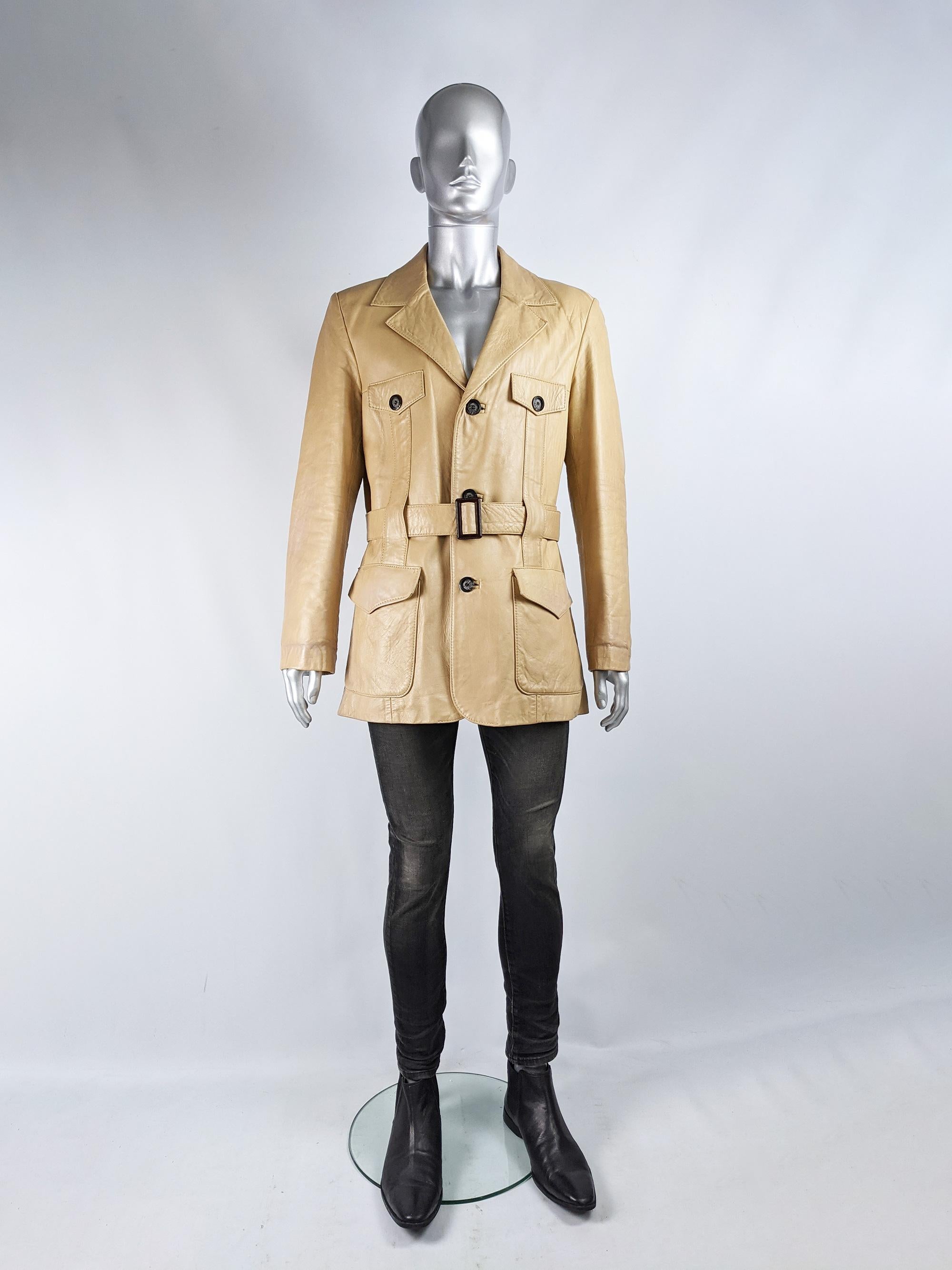 A stylish vintage mens leather jacket from the 70s by House of Sears. In a beige leather with Norfolk jacket details, like the pleats on the front, four flap pockets and a belt to pull in the waist.

Size: Unlabelled; fits like a men's XL. Please