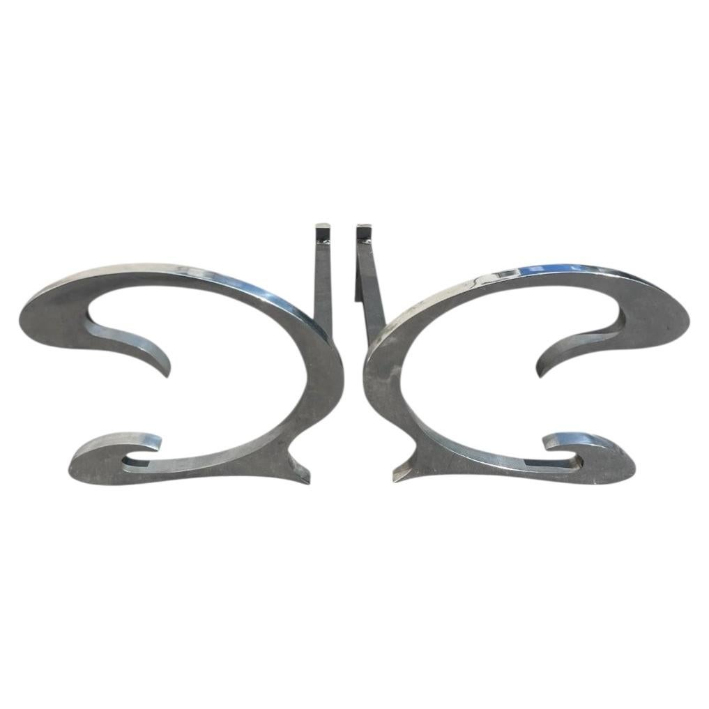 1970's metal andirons by Maison Charles et fils For Sale