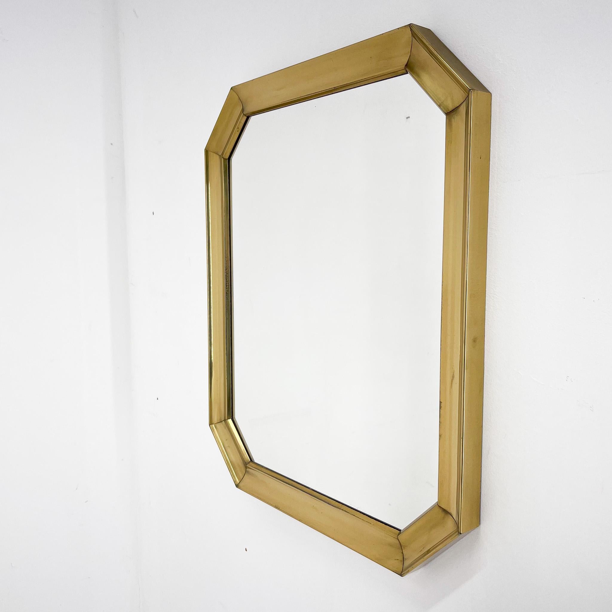 Vintage mirror made of metal in beautiful shape with original patina.