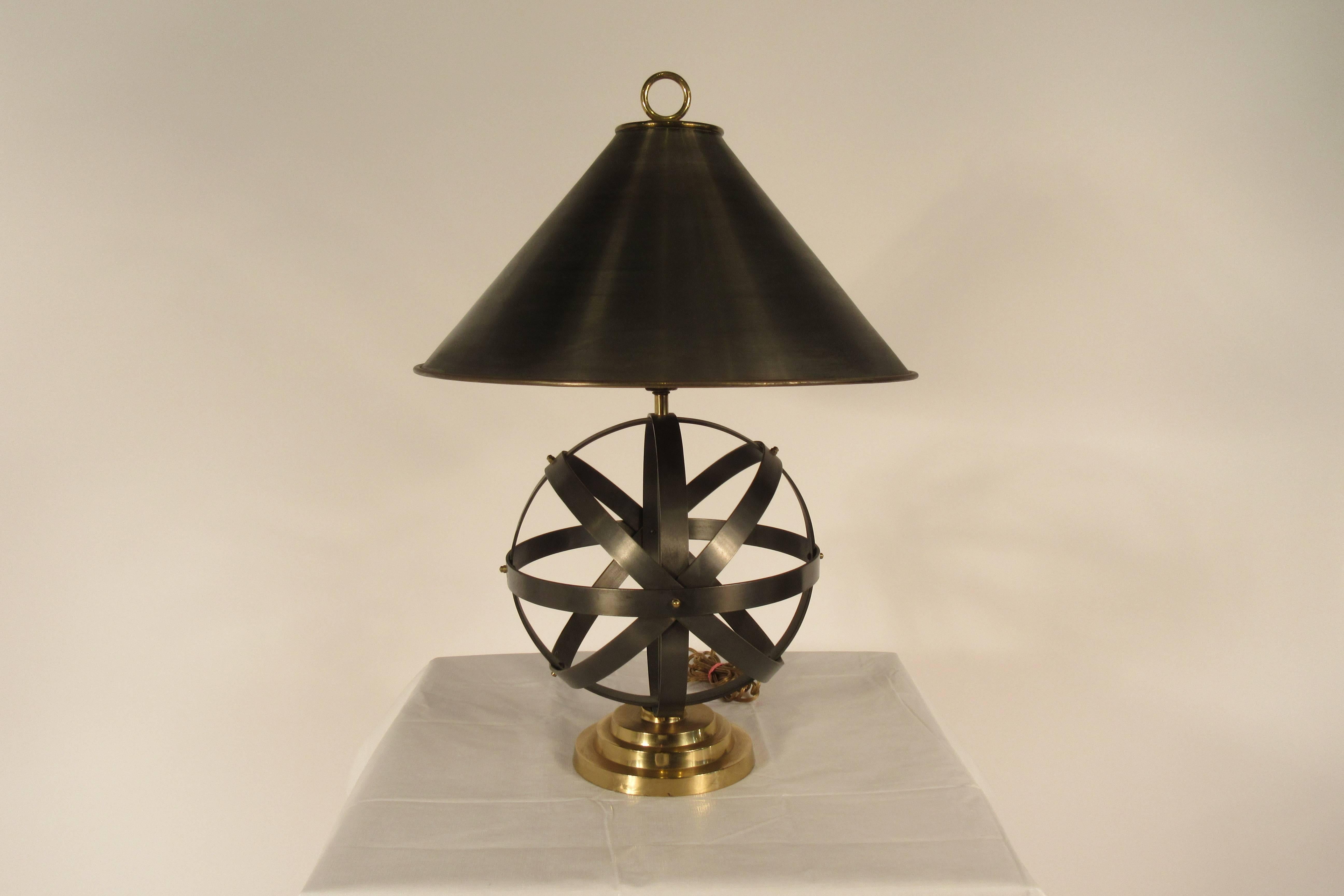 1970s metal orb lamp with metal and brass shade.