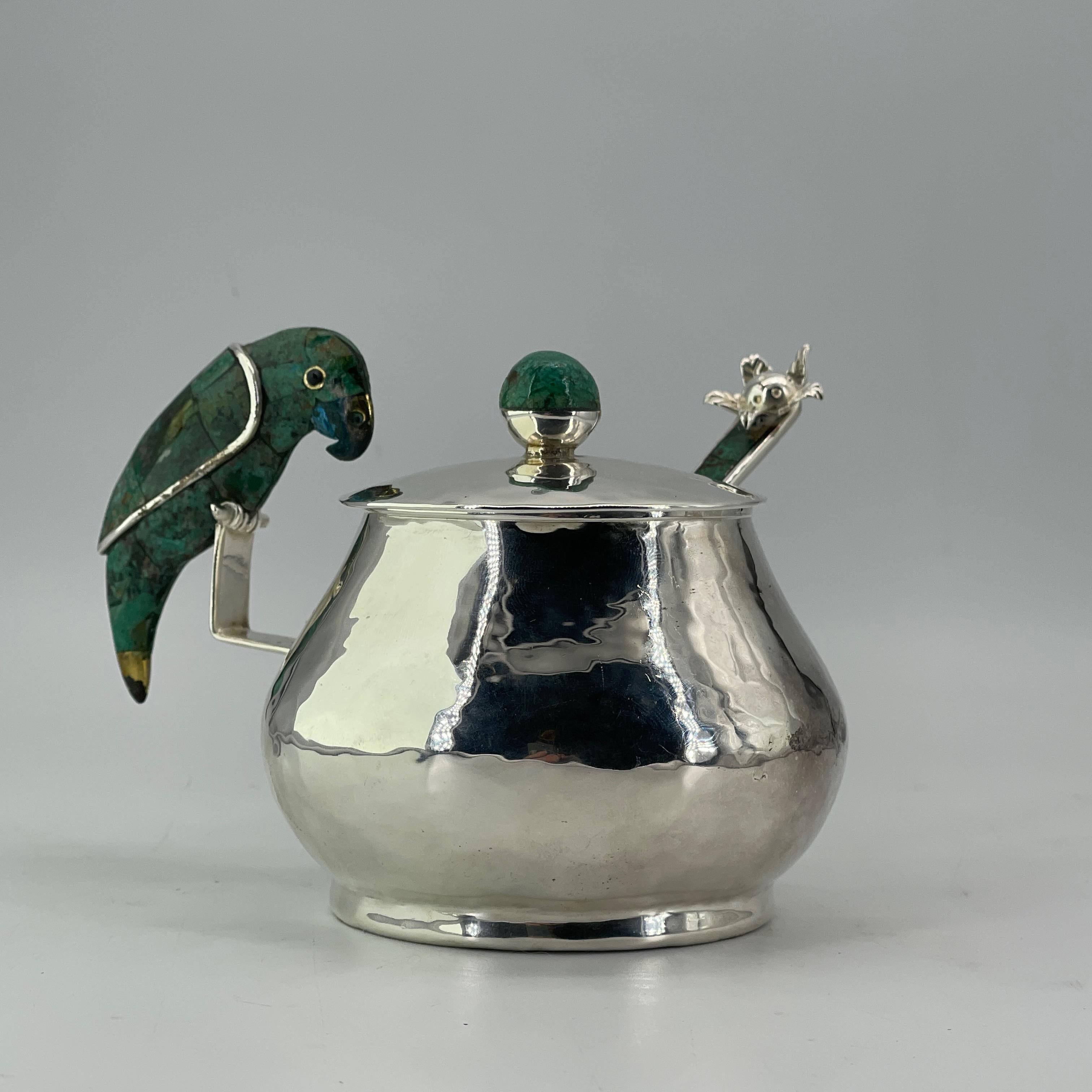 Intricate and masterful silverplated bowl with lid and spoon, with stone inlays and animal figures.  A striking work for the table. Silver plating has some areas of dark tarnish.