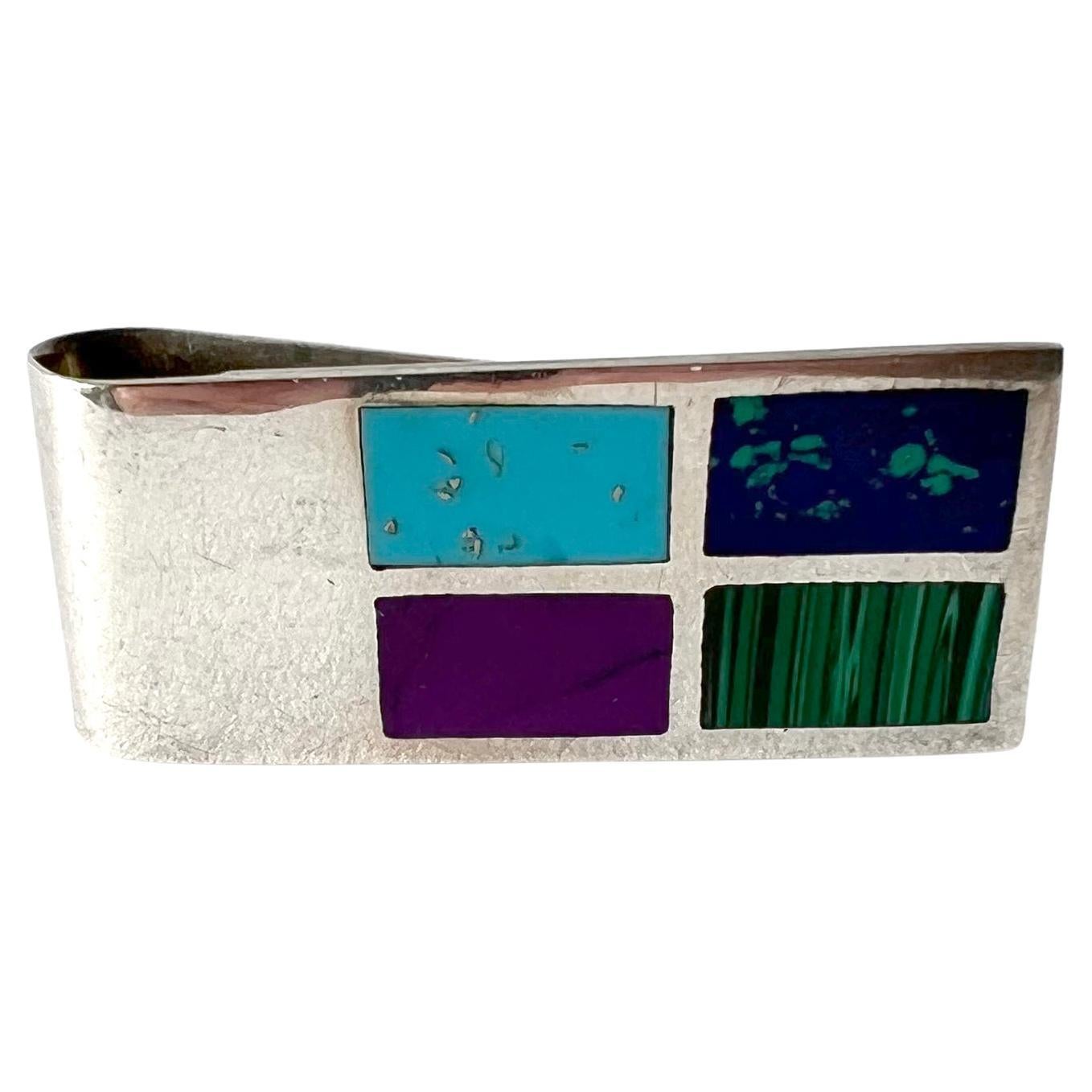 Striking 1970s Mexican modernist sterling silver money clip with natural gemstones set in mosaic style.  Clip measures 2.25