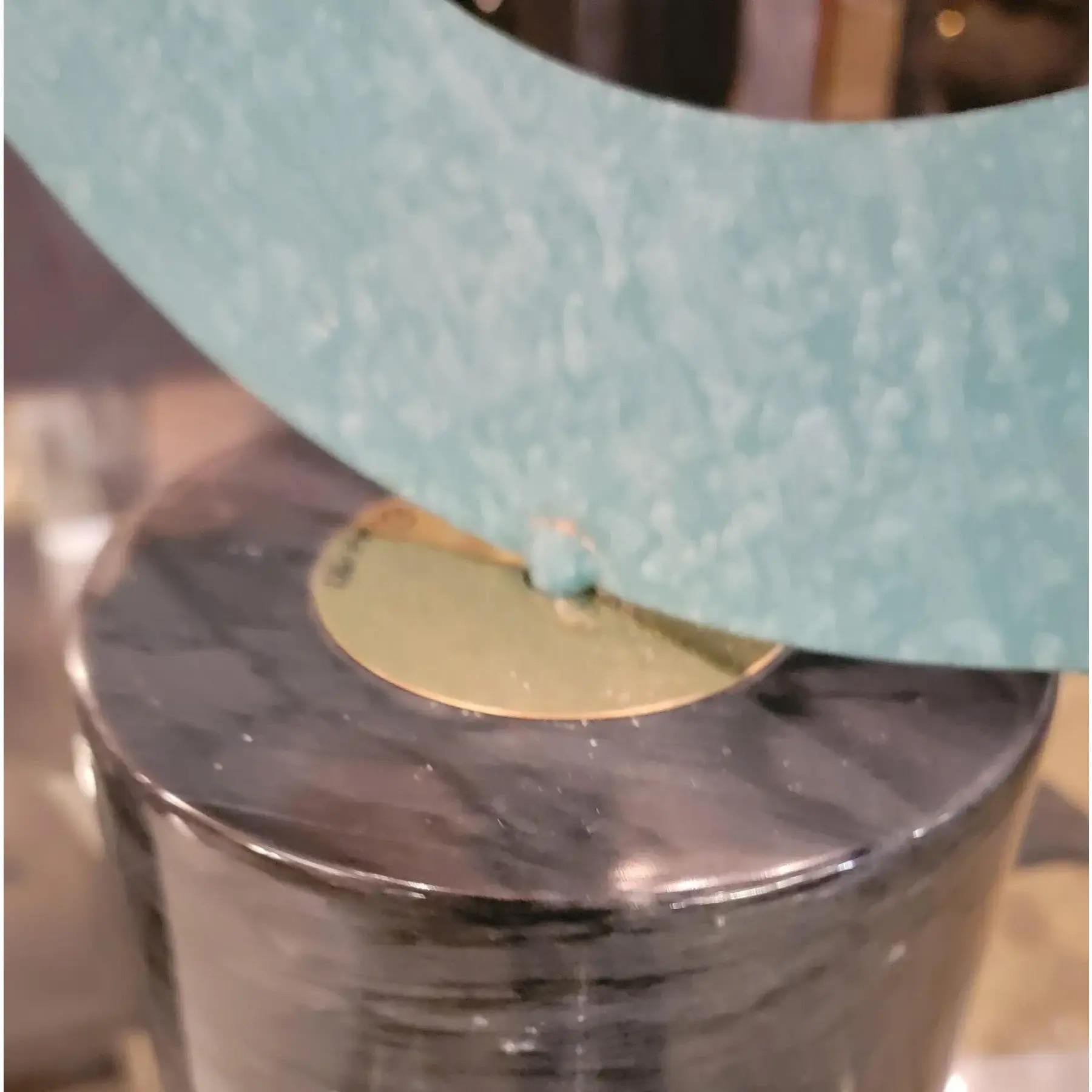 Rare mid century Curtis Jere Kinetic Sculpture in Teal with Brass and Black Marble Artisan Signed Jere 1988. The upper portion of the sculpture is removable for easier packaging or transport.