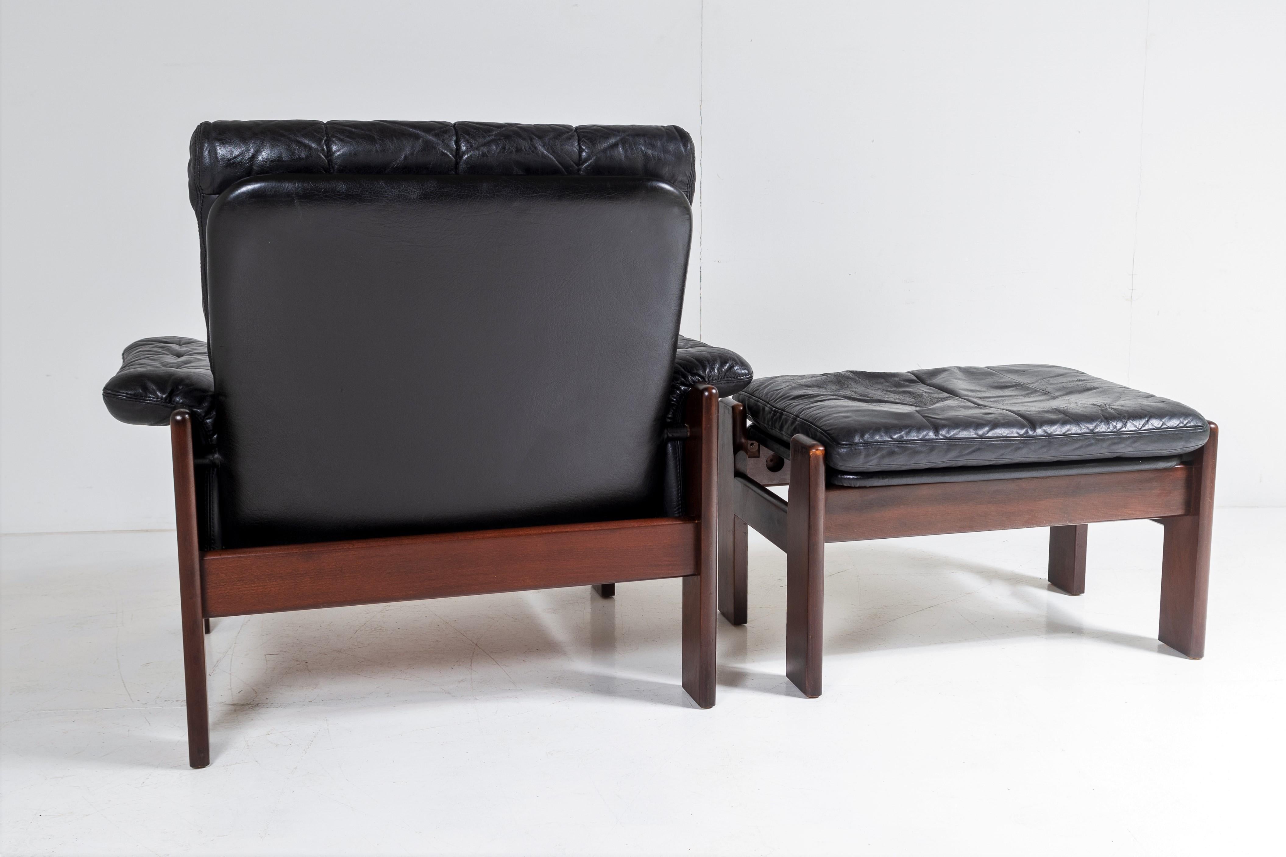 1970s Mid Century Danish Teak Rosewood and Black Leather Armchair and Footstool For Sale 6