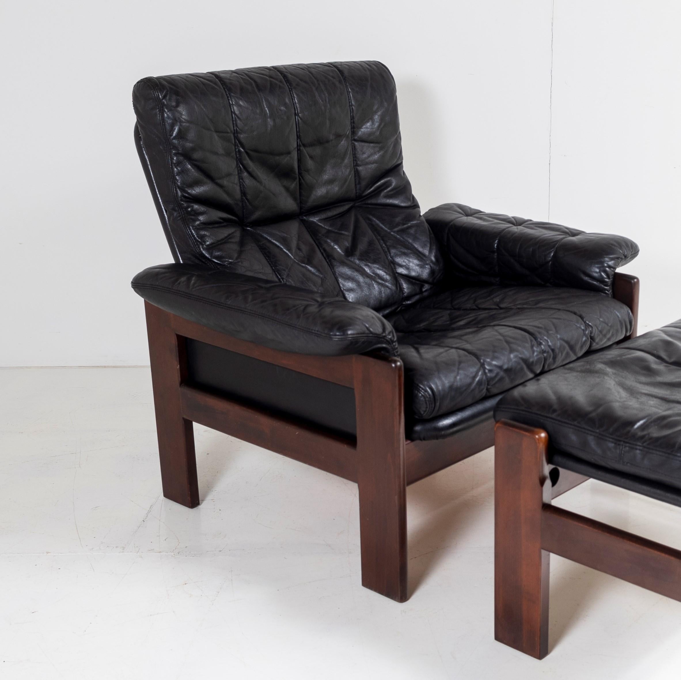 1970s Mid Century Danish Teak Rosewood and Black Leather Armchair and Footstool For Sale 7