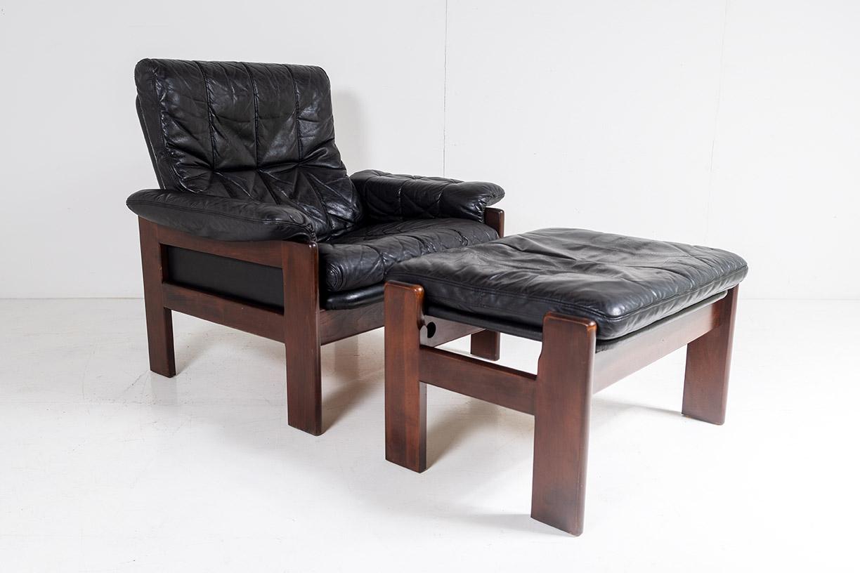 1970s Mid Century Danish Teak Rosewood and Black Leather Armchair and Footstool For Sale 11