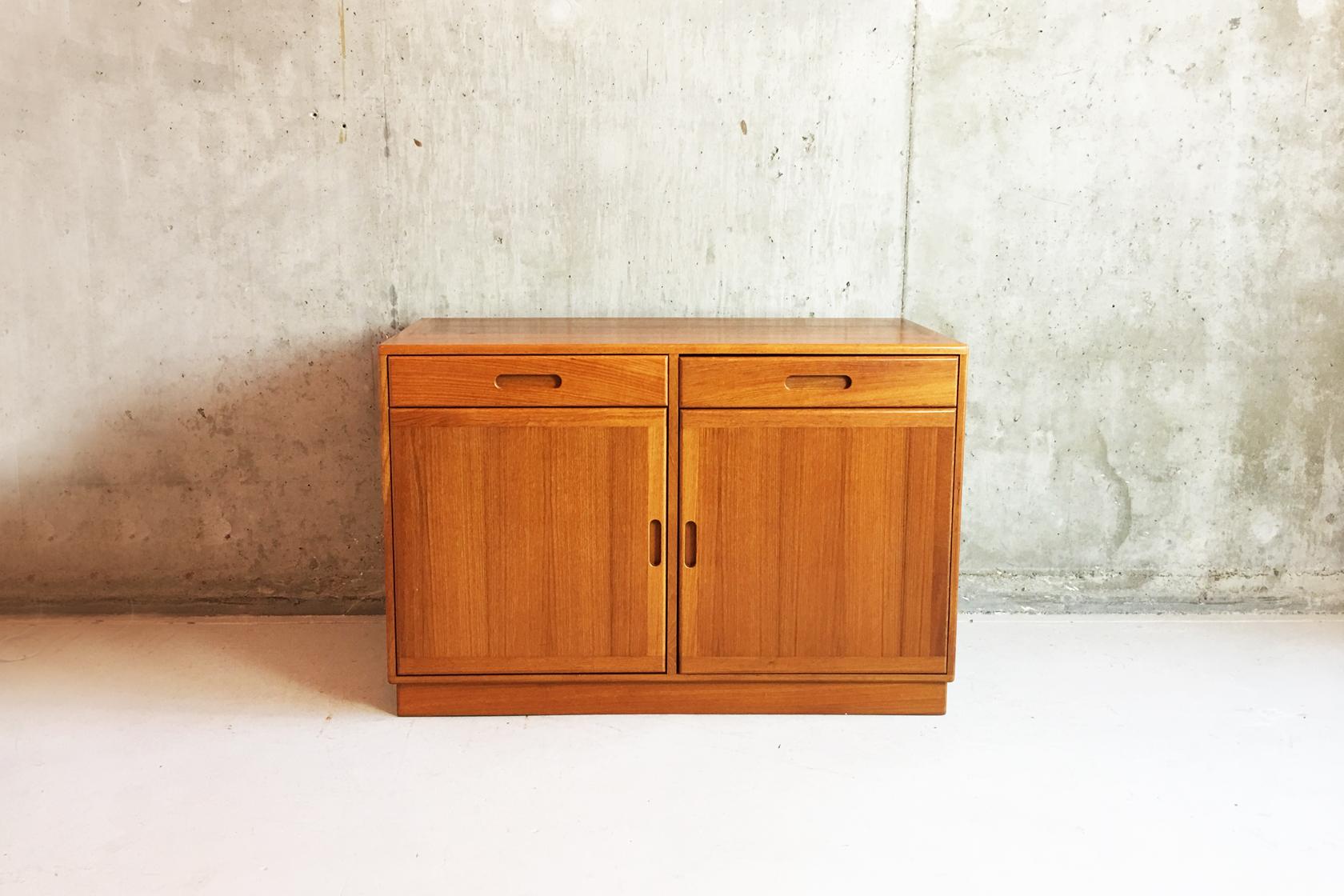 A rare G Plan sideboard style, extremely minimal and restrained with a distinct Danish feel. Deeper and less wide than a normal sideboard. In superb condition. Very solid, well made and substantial piece.

G Plan labelled.
 