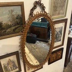 Espejo de pared ovalado italiano de bambú de mediados de siglo XX by Bonacina