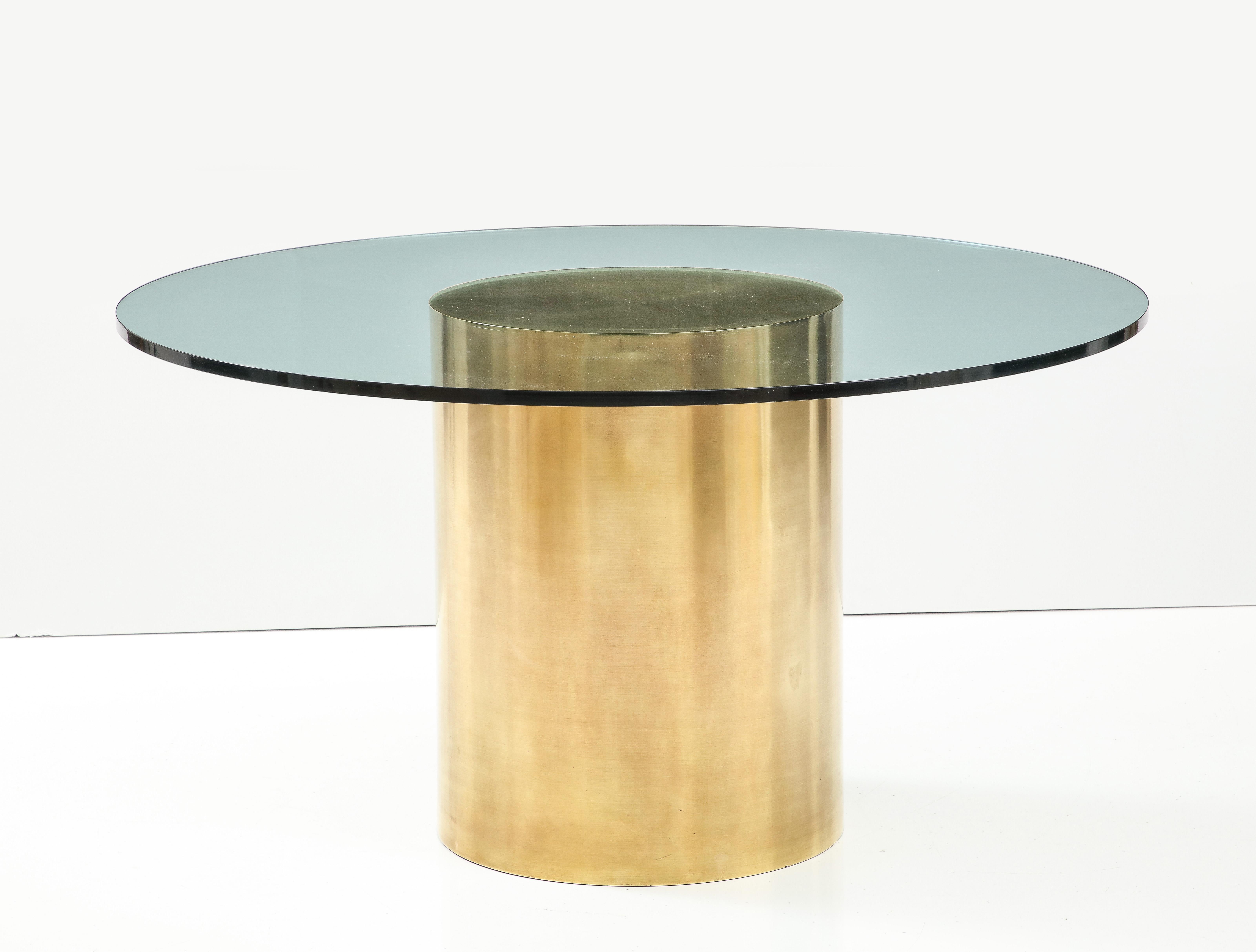 Stunning 1970's Mid-Century Modern solid brass drum base with 3/4 glass dining table attributed to Brueton, in vintage original condition with beautiful patina to the brass, with some wear to the base due to age and use, there is a few light