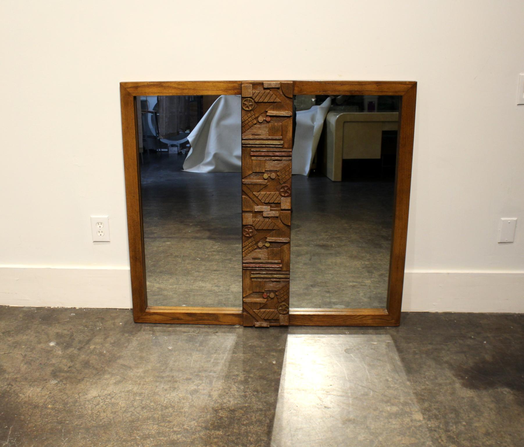 Dresser mirror from one of Lane Furniture's Classic 1970s Brutalist bedroom sets. Warm walnut wood with rough-hewn mosaic pattern in center, subtle painted highlights. Two 17 x 37