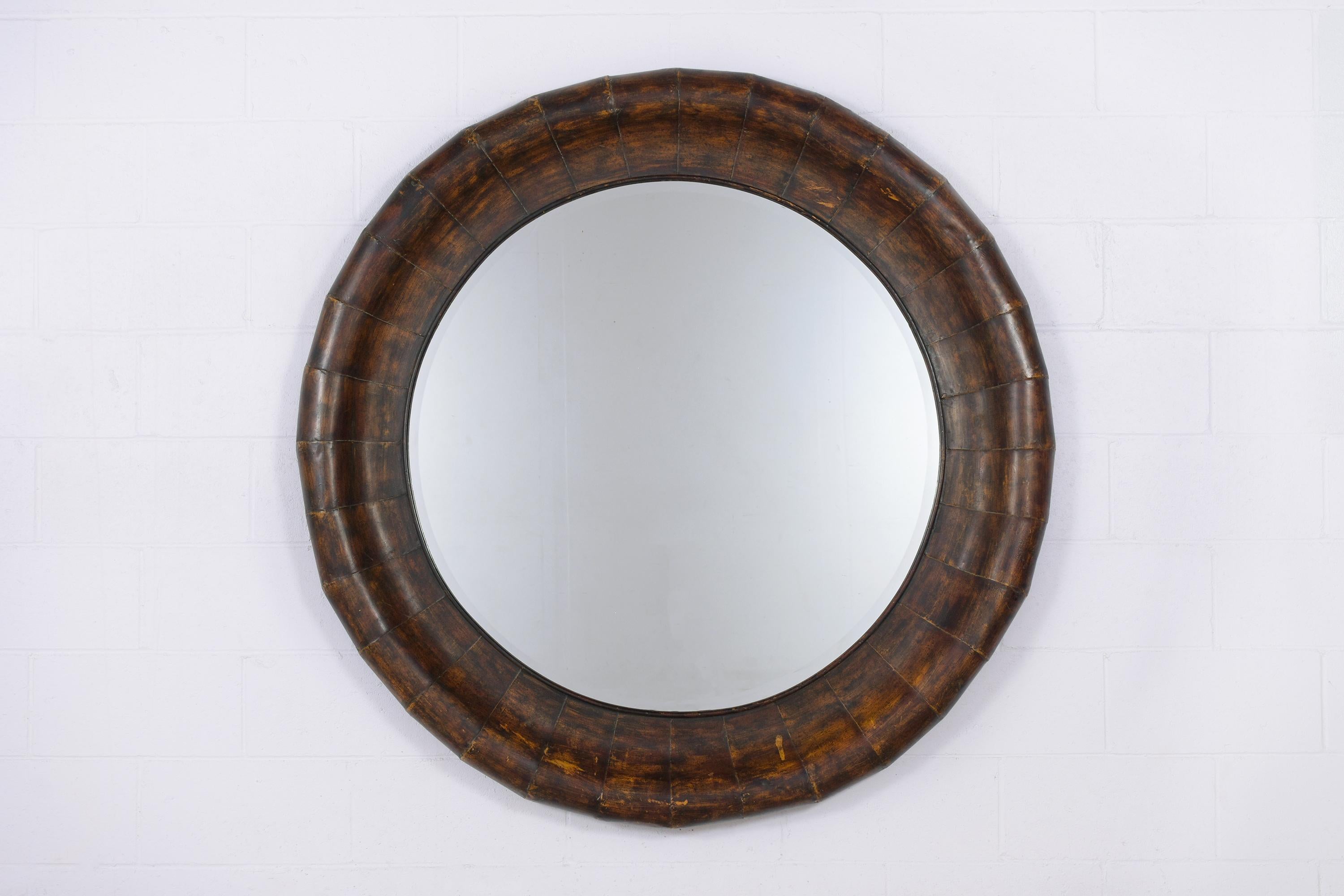 Enhance your decor with our stunning 1970s Mid-Century Modern Circular Mirror, a remarkable piece that combines vintage charm with contemporary flair. Beautifully crafted from metal, this mirror is in great condition, ready to bring a touch of retro