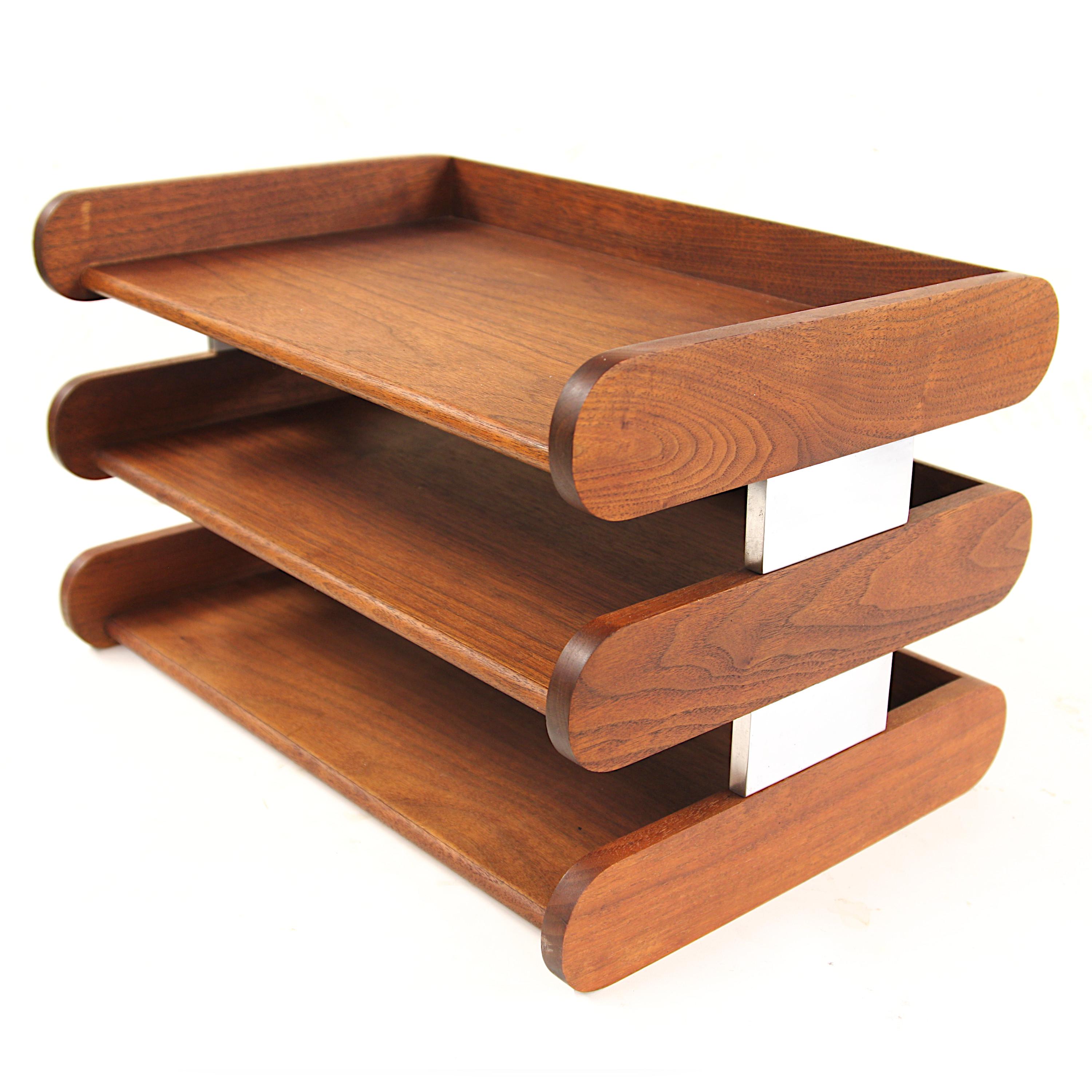 Wonderful Mid-Century Modern paper/letter tray by Peter Pepper Products of Compton, CA. Tray features solid walnut & polished aluminum construction with a wonderful 3-tiered design. The perfect desk accessory to accentuate any Mid-Century Modern