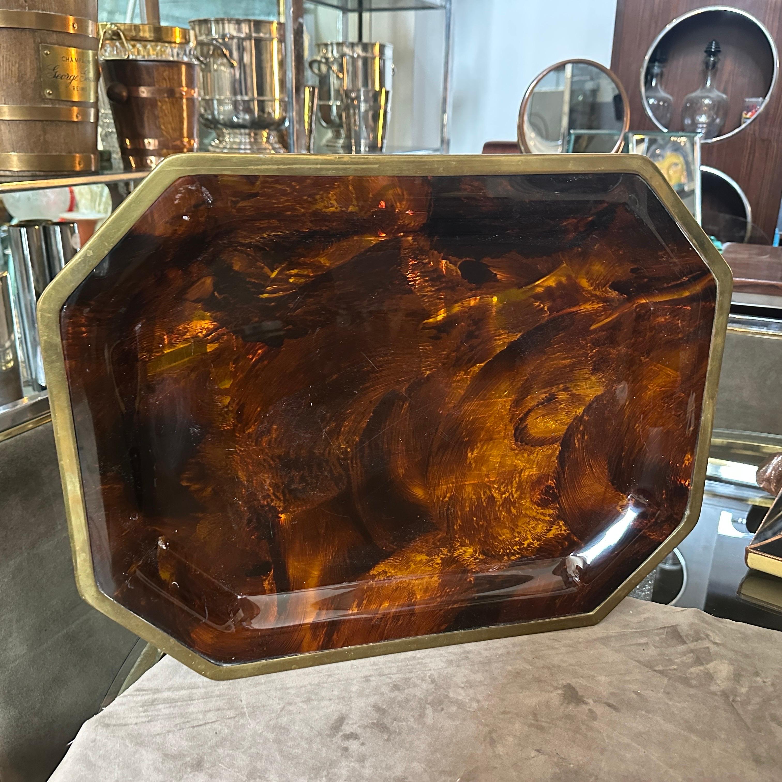 An octagonal serving tray designed and manufactured in Italy by Alberto Sordi, the tray is in good conditions overall with normal signs of use and age and brass in original patina. This serving tray is inspired by the collections for home of