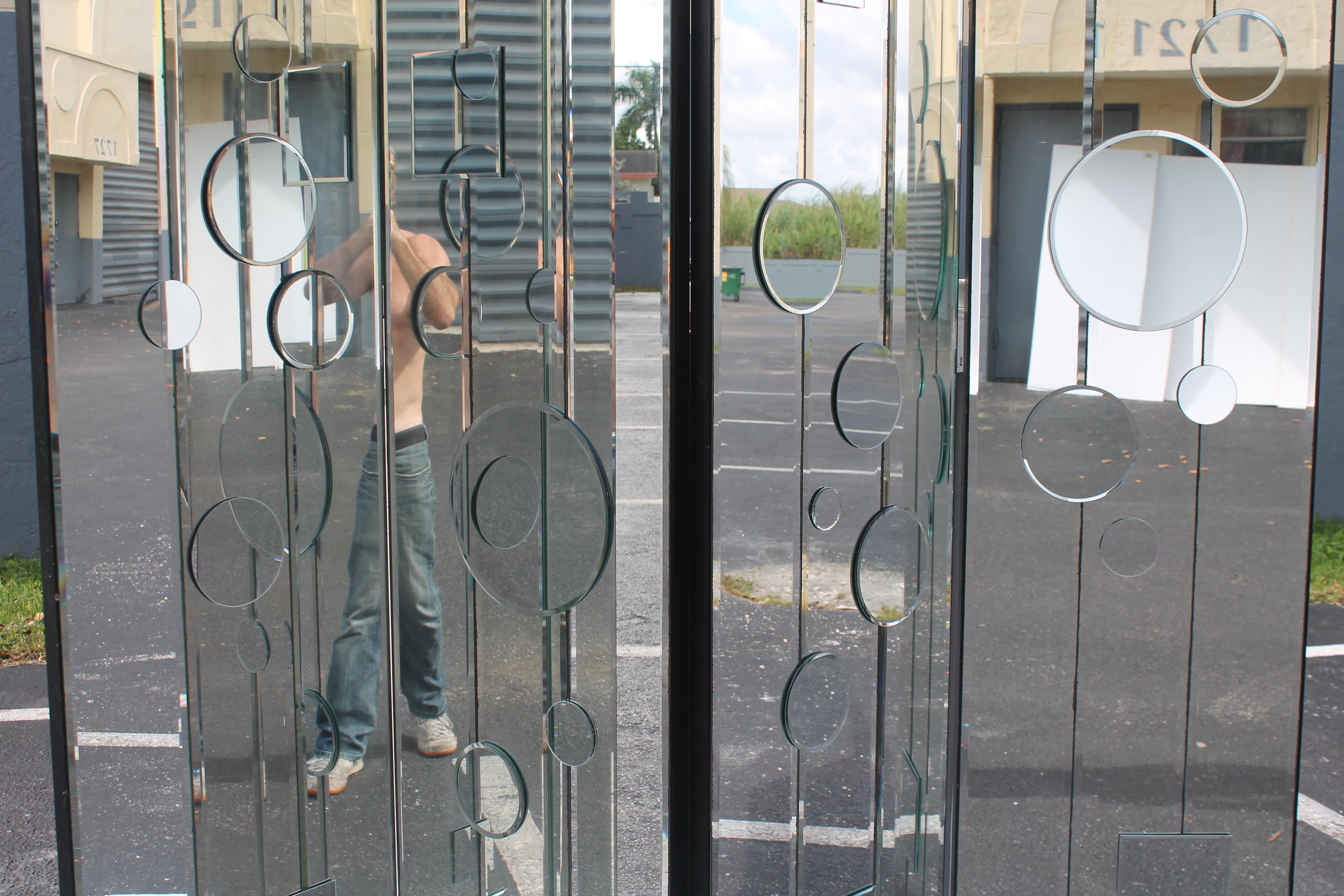 1970's Mid Century Modern Fully Mirrored Large Room Dividing Screen. 4 panels, decorative mirror on mirror detail.