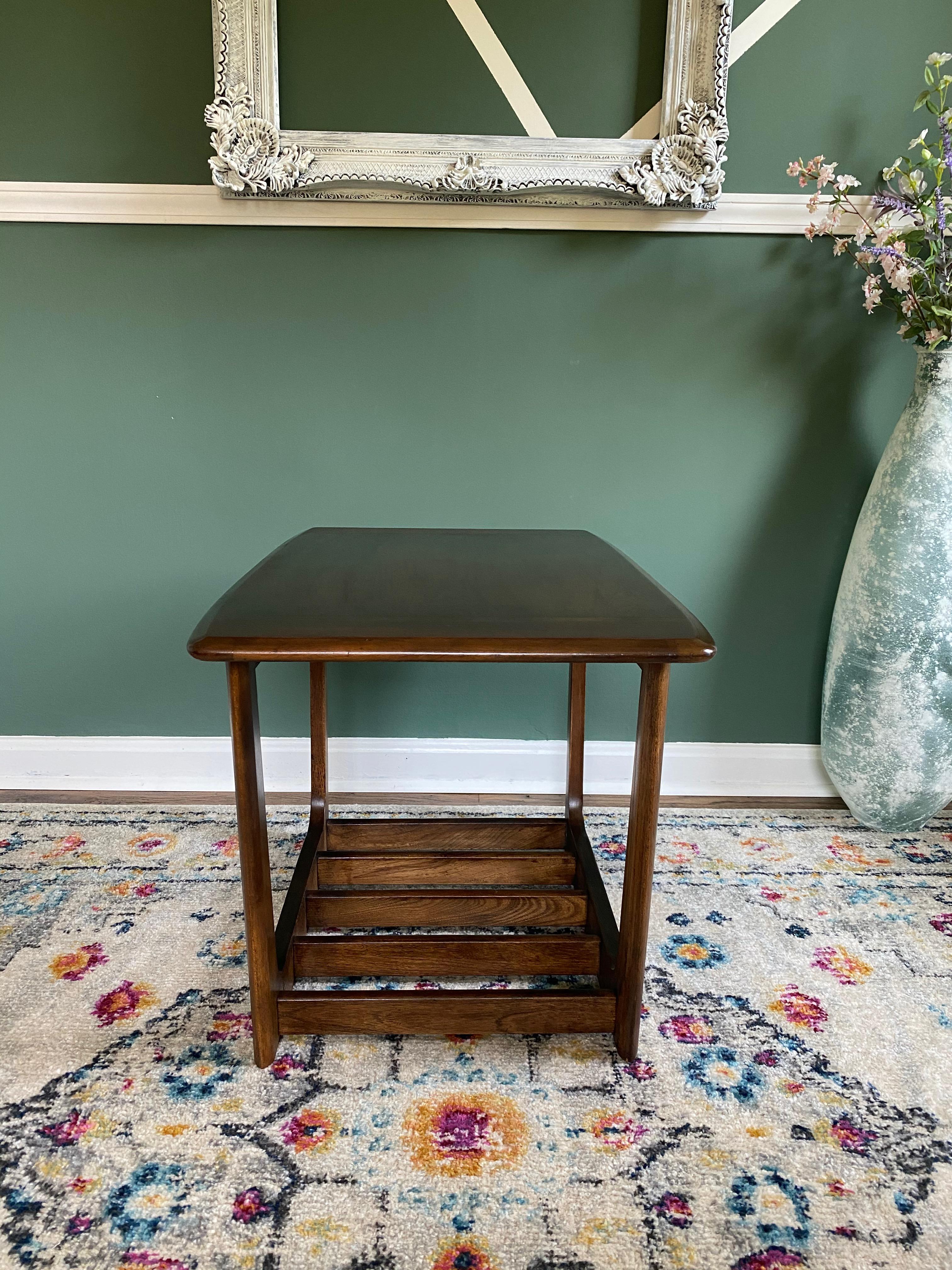 Beautiful refinished mid-century modern Lane (unmarked) Surfboard side table! Unique piece with a magazine rack style bottom and beautiful legs and top. Perfect to add to your living room or office! There are little to no imperfections due to age.