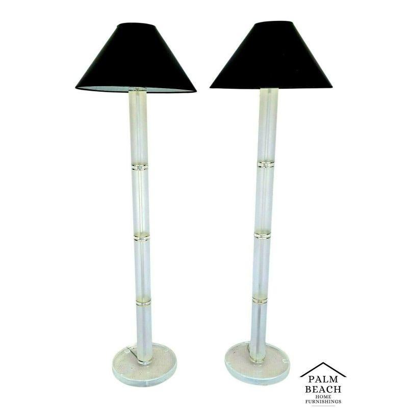 Offering one of our recent Palm Beach Estate fine lighting acquisitions of a
Pair of MCM 1970's Optique style lucite floor lamps

The shades clip onto the bulbs.

Measures: 64