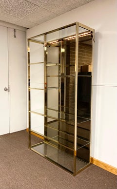 1970s Mid-Century Modern Polished Brass Glass and Mirror Etagere