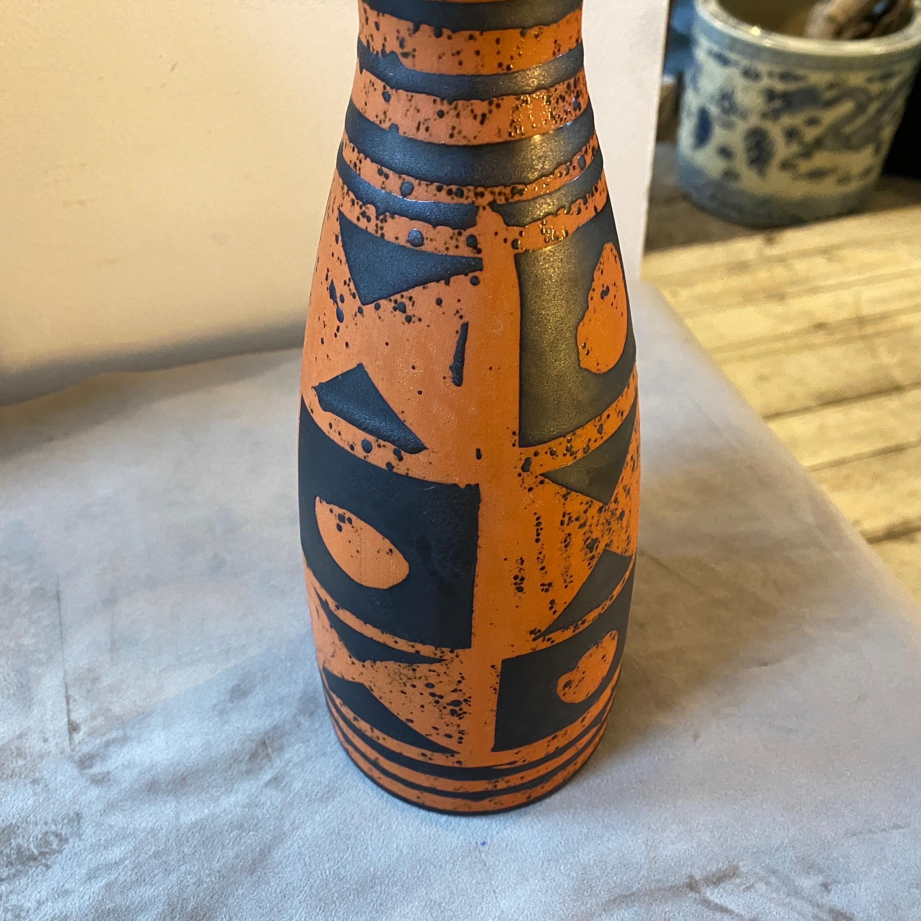 A rare red and black ceramic vase made in West Germany in the Seventies by famous manufacturer Carstens Tönnieshof, it has hand-painted and it's in perfect condition.