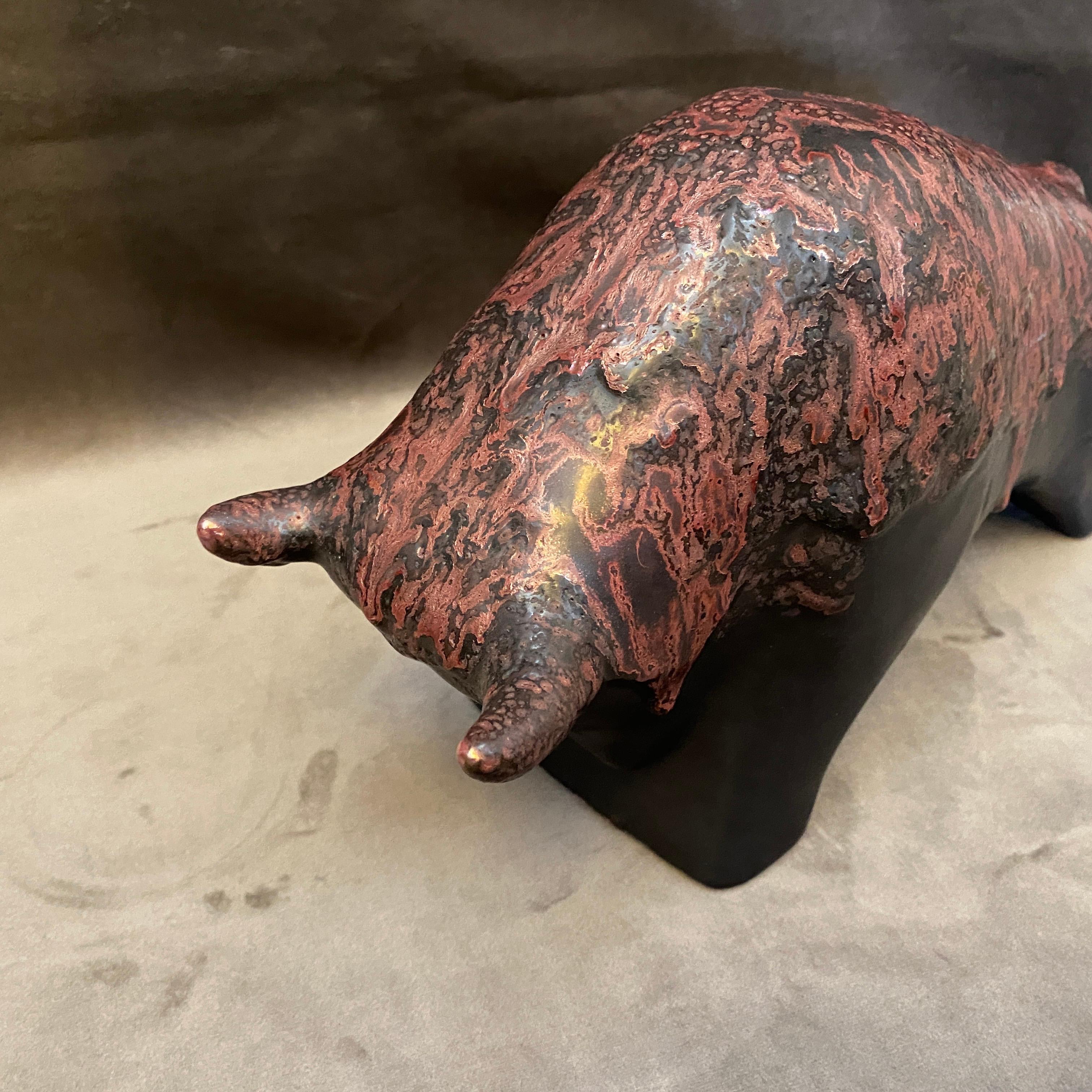 A ceramic bull made in. Germany in the seventies. This kind of ceramic, very popular in that period has been called Fat Lava Keramik. Item it's in perfect conditions.