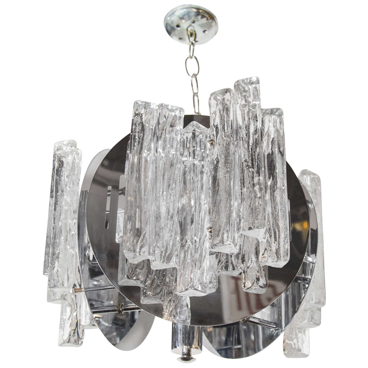 Mid-Century Modern trilateral chandelier with ice glass details. The fixture is comprised of a chrome frame with circular chrome discs. The discs have open slat details and are fitted with hand blown textured ice glass. Adjustable chain height and