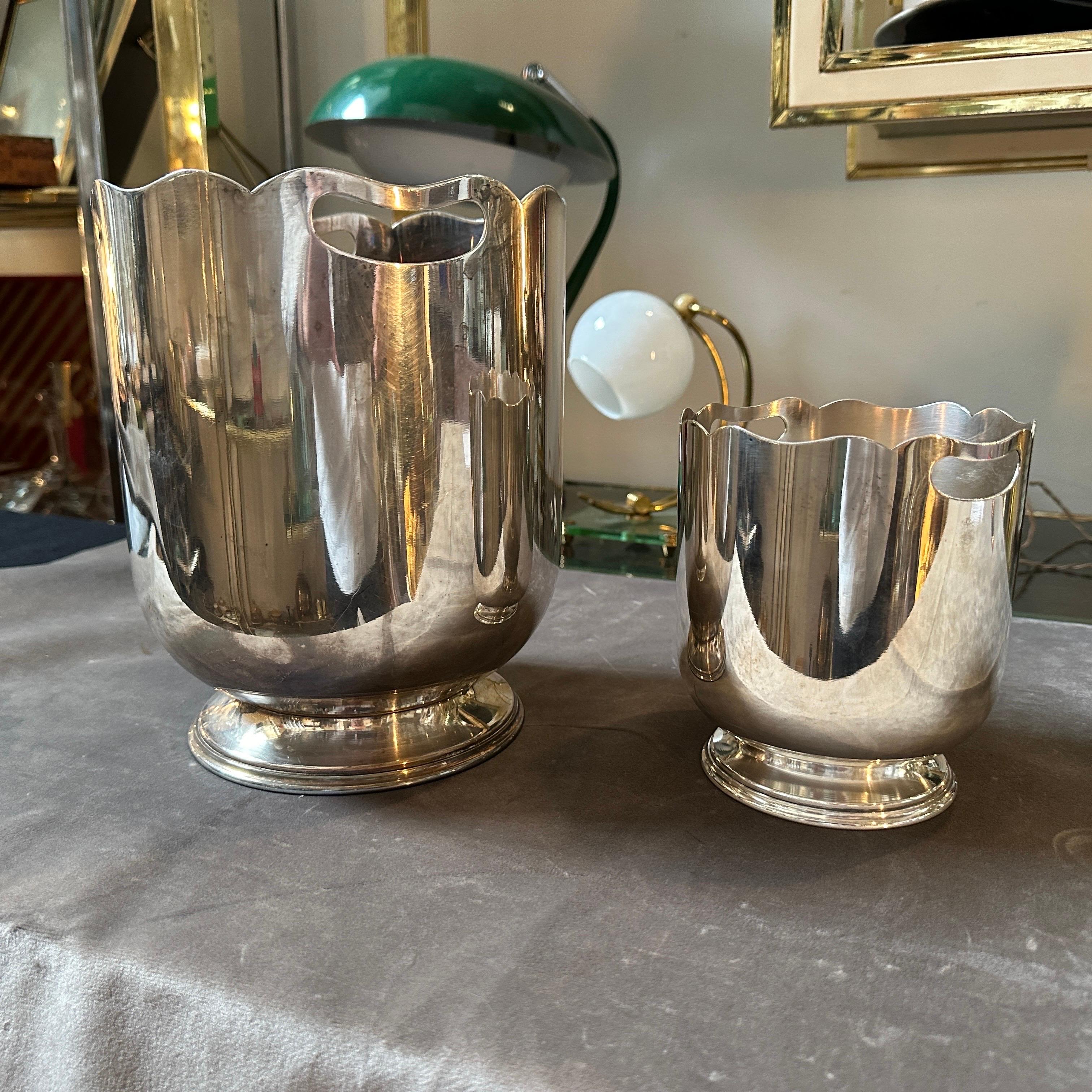 A set of french vintage barware composed by an ice bucket and wine cooler. They are hall marked on the bottom and in very good conditions overall. The height of ice bucket is 14 cm. The body of the two pieces crafted from high-quality silver-plated