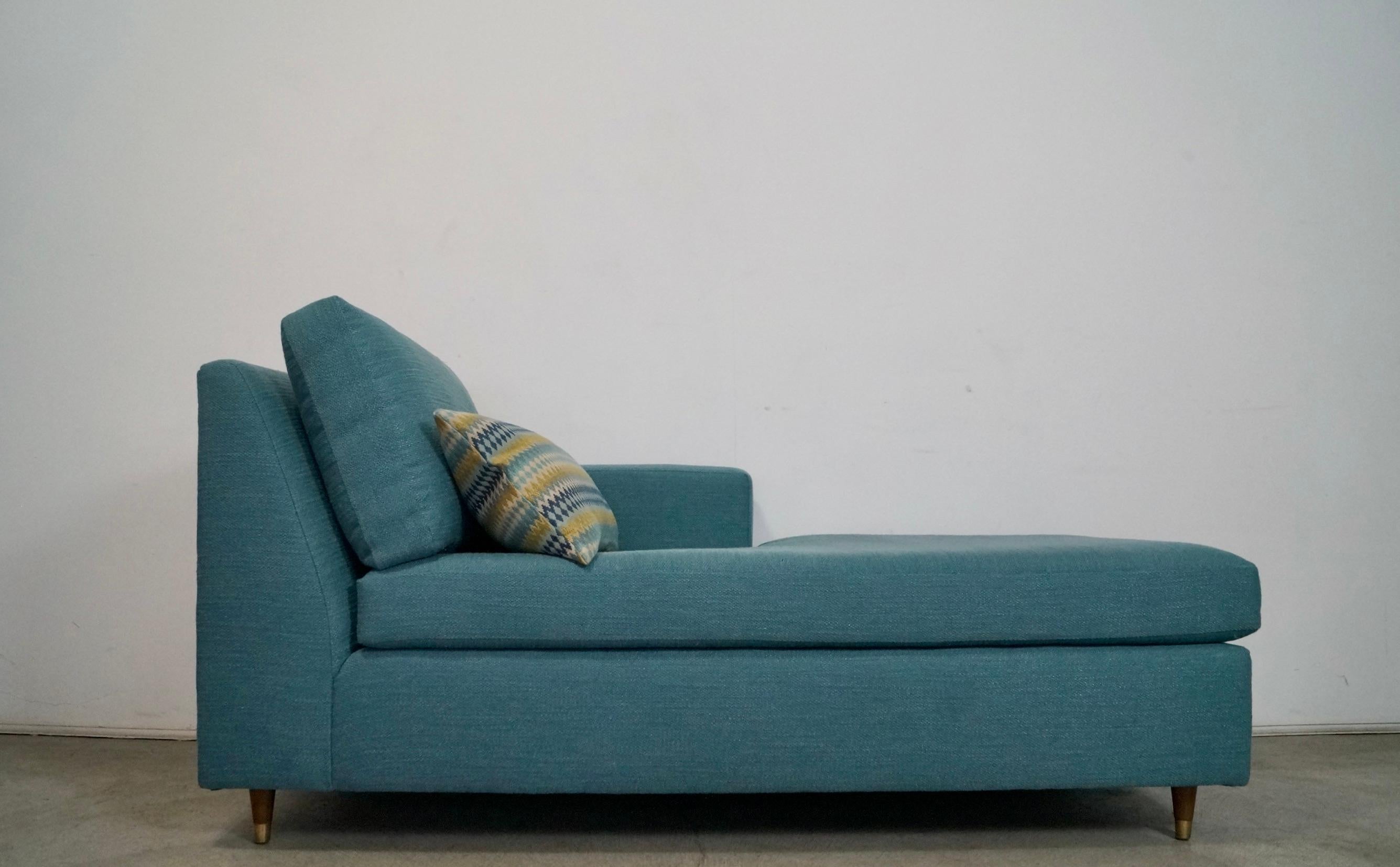 Vintage 1970's Mid century Modern daybed for sale. Has been professionally reupholstered in a teal textured nubby tweed with new foam. Great clean design and style with a back cushion and comes with a throw pillow that is down filled. Has an arm on