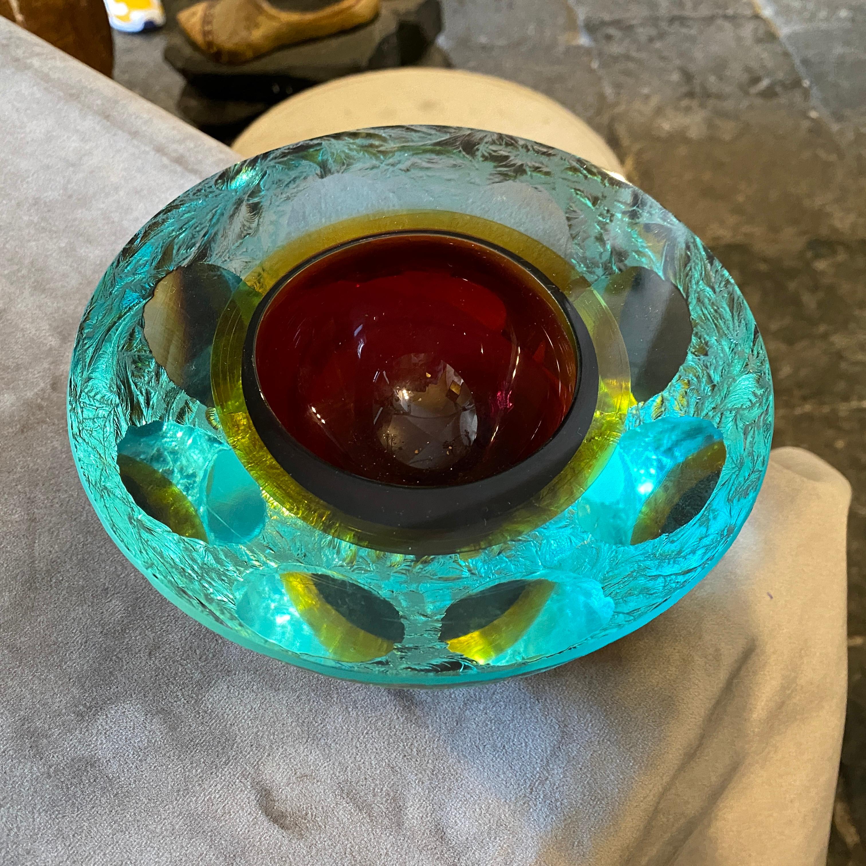 An amazing blue, red and yellow Murano glass bowl. It's a rare one, engraved on the sides, perfect conditions.