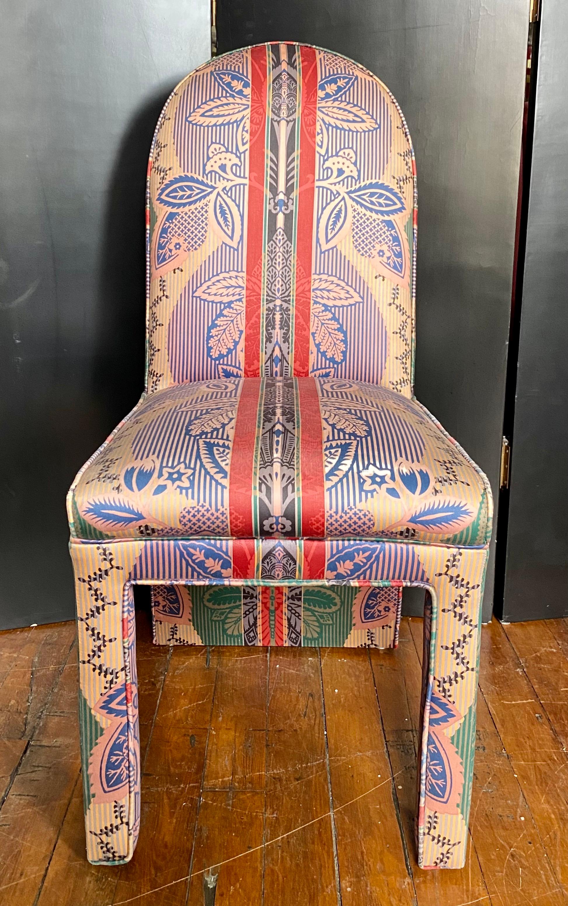 Fabulous set of four sculptural arched parsons dining chairs in a graphic Gucci inspired fabric. These Mid-Century Modern armless dining chairs are fully upholstered in a striking striped damask fabric. 

Measures: Seat Width: 18 Inches.
Seat Depth: