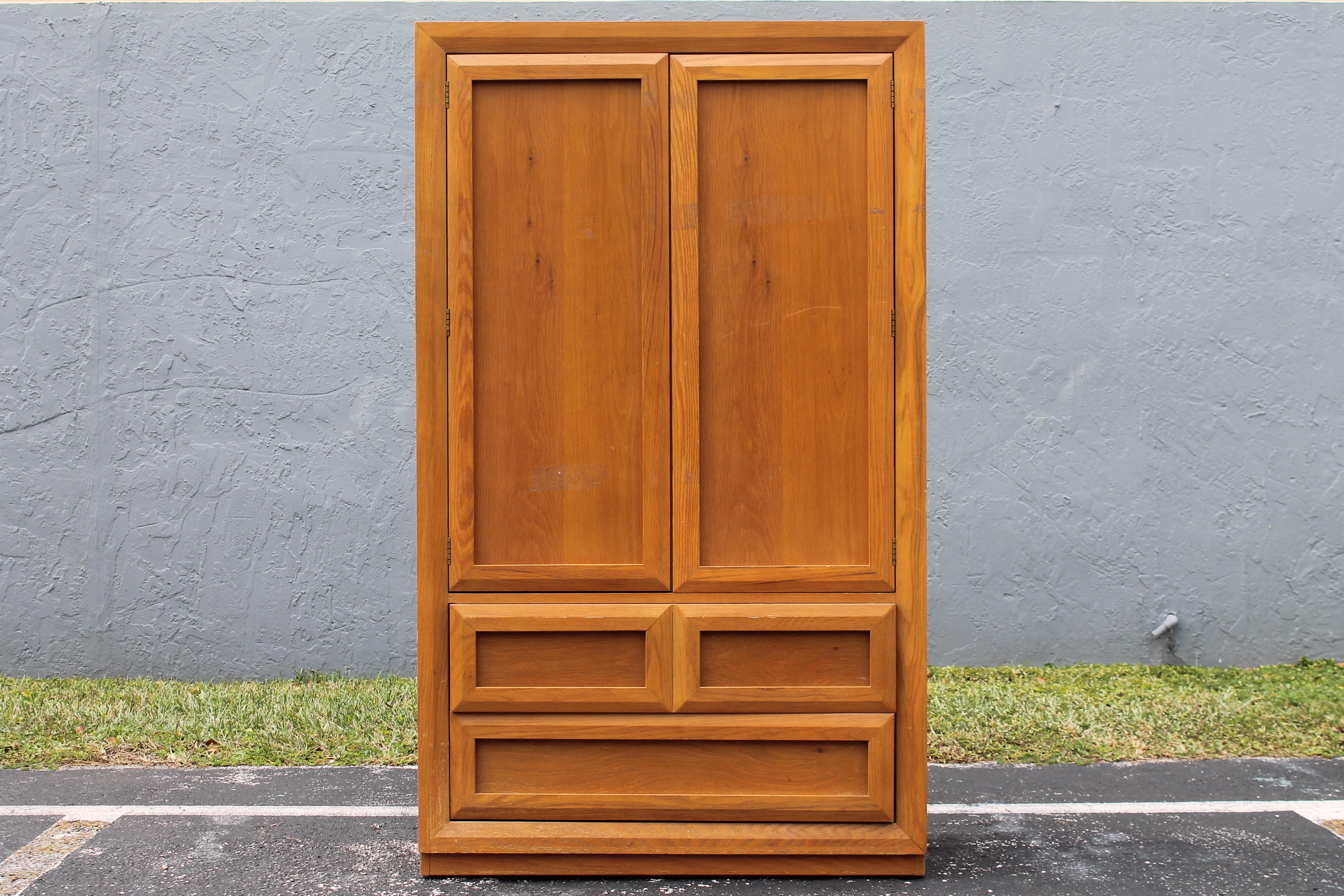 1970's Mid Century Storage Cabinet by Thomasville. Beautiful piece! 4 drawer, 1 adjustable shelf and 1 adjustable/ removable shelf. Color is a medium toned brown.