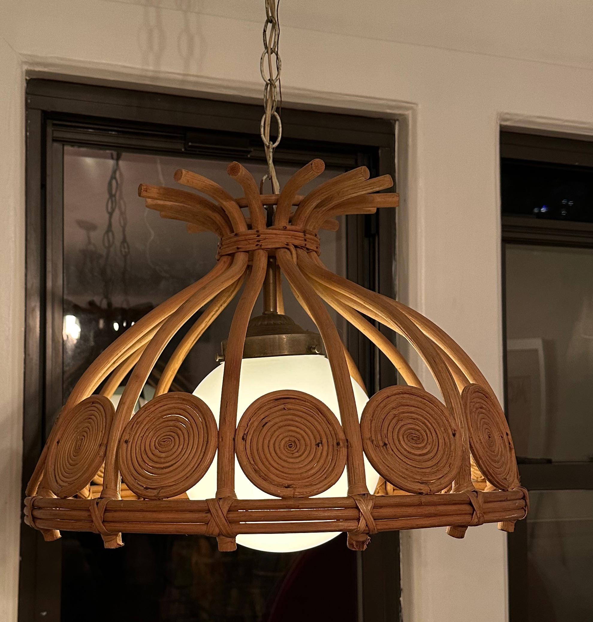Illuminate your space with a touch of timeless charm. Vintage Rattan Hanging Pendant Lamp brings warmth and character to any room, blending natural elegance with retro allure. A captivating focal point that transcends trends, casting a warm glow and
