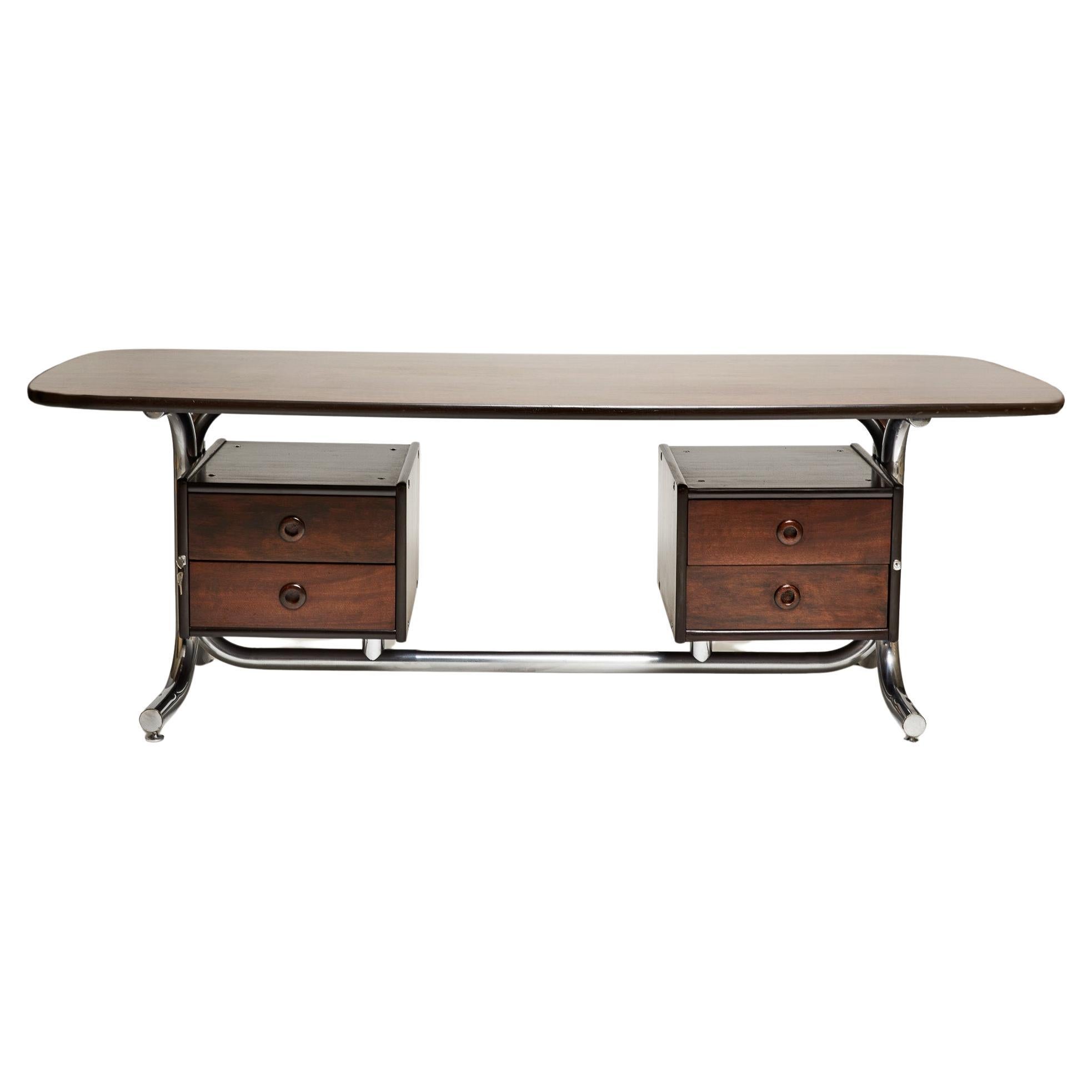 This Brazilian Modern desk has a chromed tubular metal base with top and drawers in agglomerated wood and Jacaranda (Brazilian rosewood) leaf. It has 4 floating drawers; keys are available. The wood has been refinished, the metal cleaned up and the