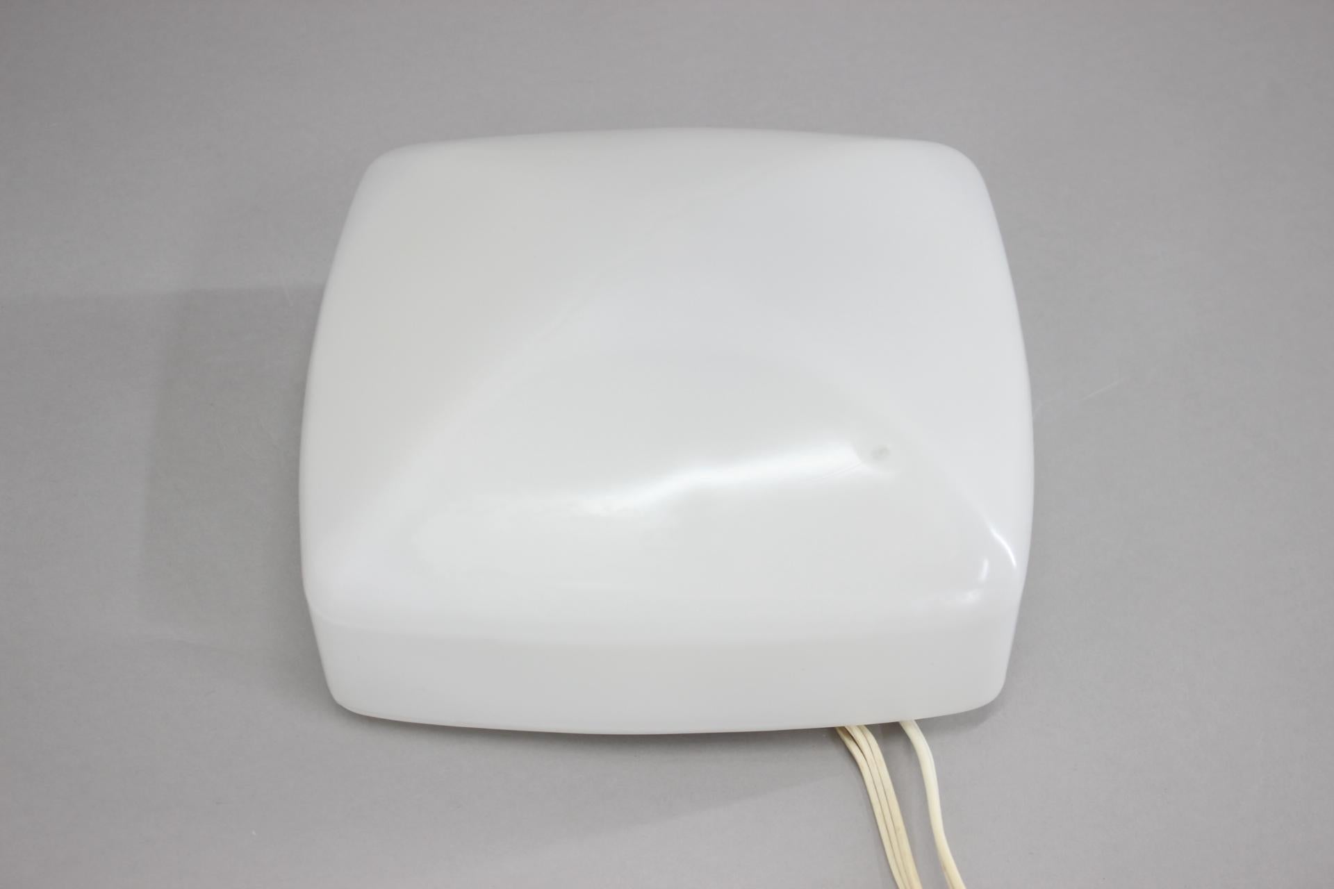 - Vintage milk glass square shaped wall or ceiling lamp.
- Made in former Czechoslovakia in the 1970's.