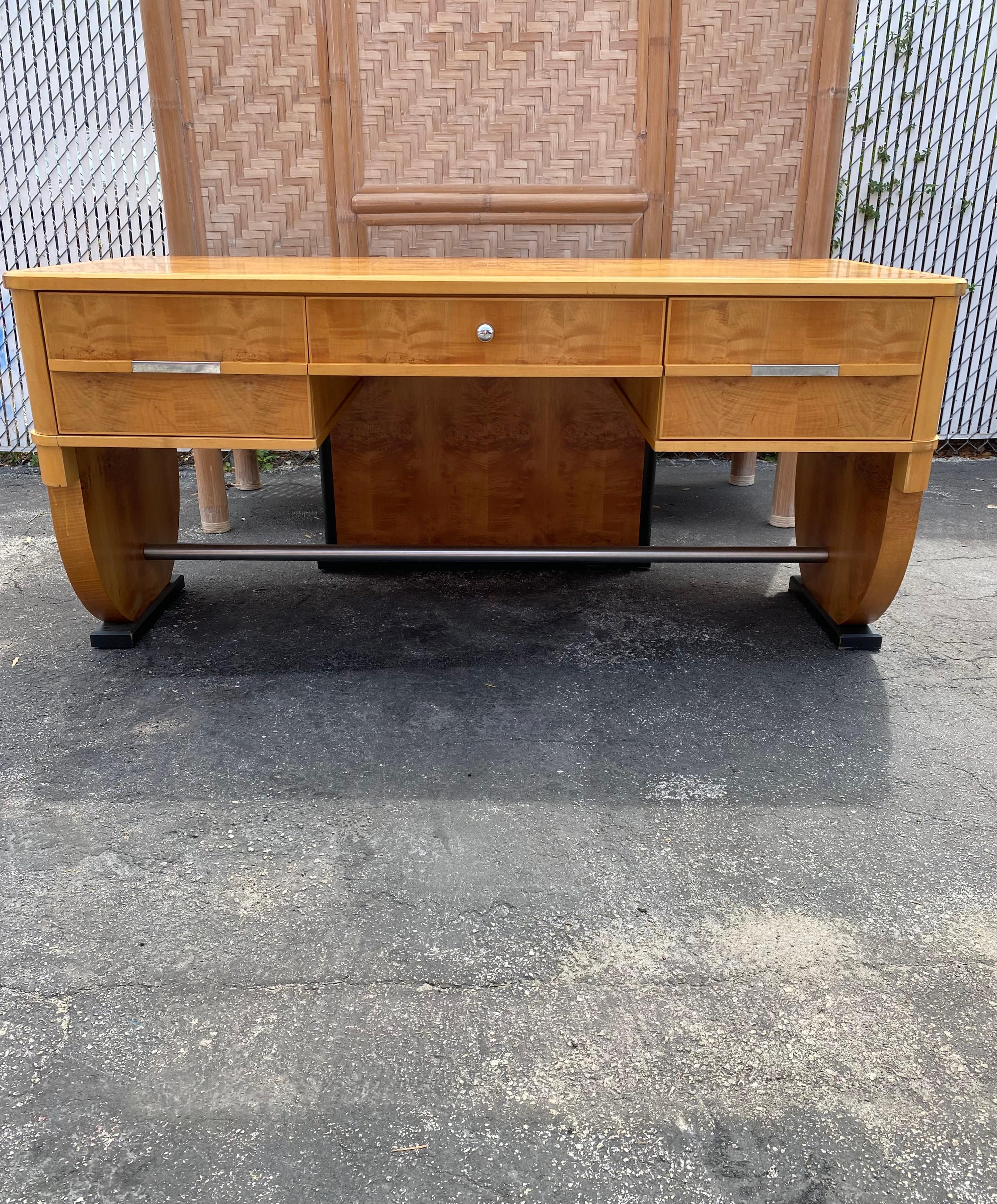 On offer on this occasion is one of the most stunning and one of a kind, sculptural Burlwood solid wood desk you could hope to find. Outstanding design is exhibited throughout. Chrome hardware. The beautiful desk is statement piece and packed with