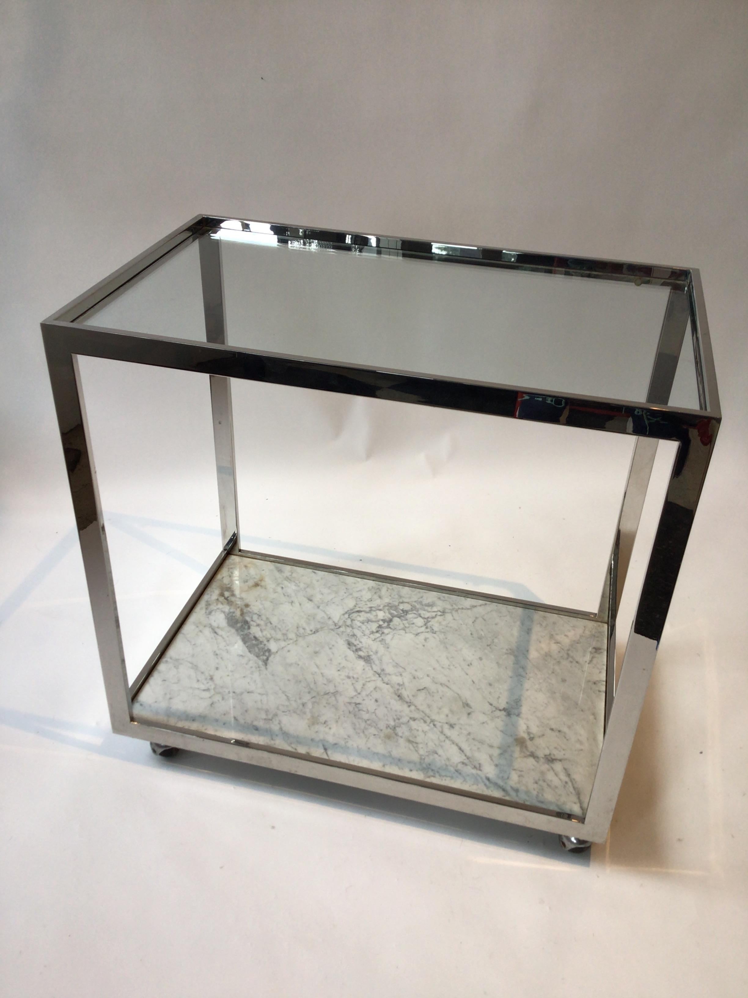 1970s Milo Baughman chrome glass and marble bar cart. Stains on marble as shown in second to last image.