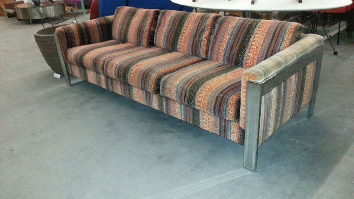 1970s chromium steel framed sofa with Lenor Larsen velvet upholstery by Selig.
1970s psycedelic striped Lenor Larsen velvet upholstery.
This vintage sofa is in it's original vintage condition.
The Lenor Larsen velvet upholstery is faded, but way to