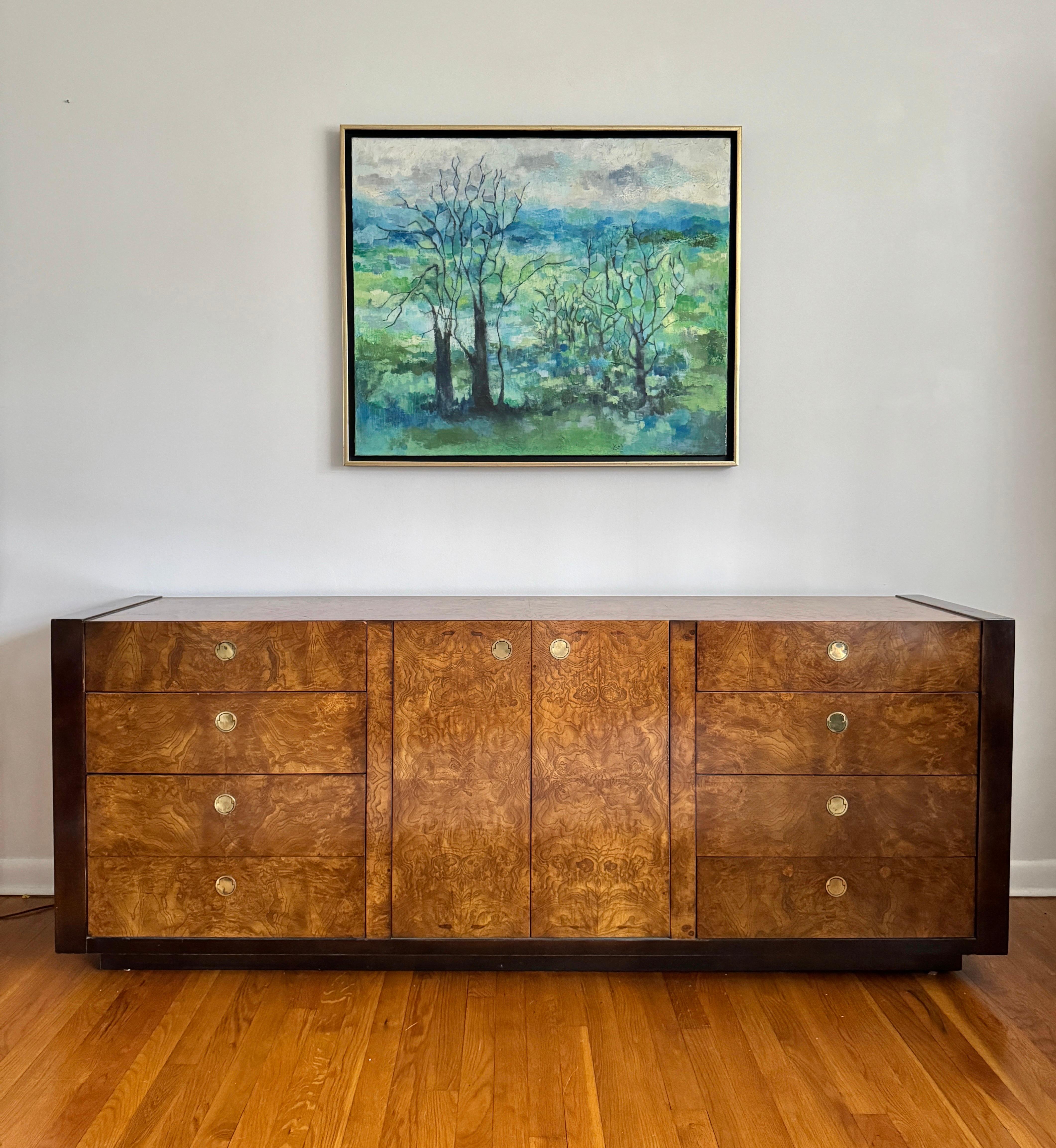 A Century Furniture dresser crafted from burl wood and mahogany with brass handles, featuring 12 spacious interior drawers.