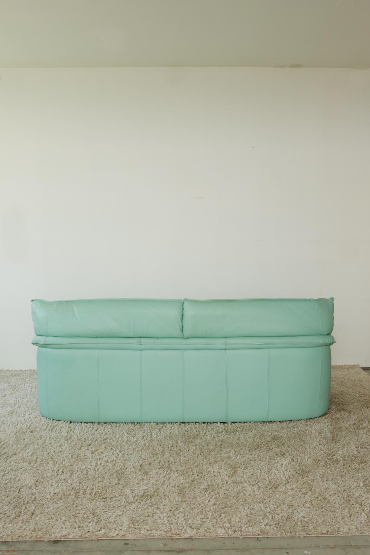 mint green leather sofa