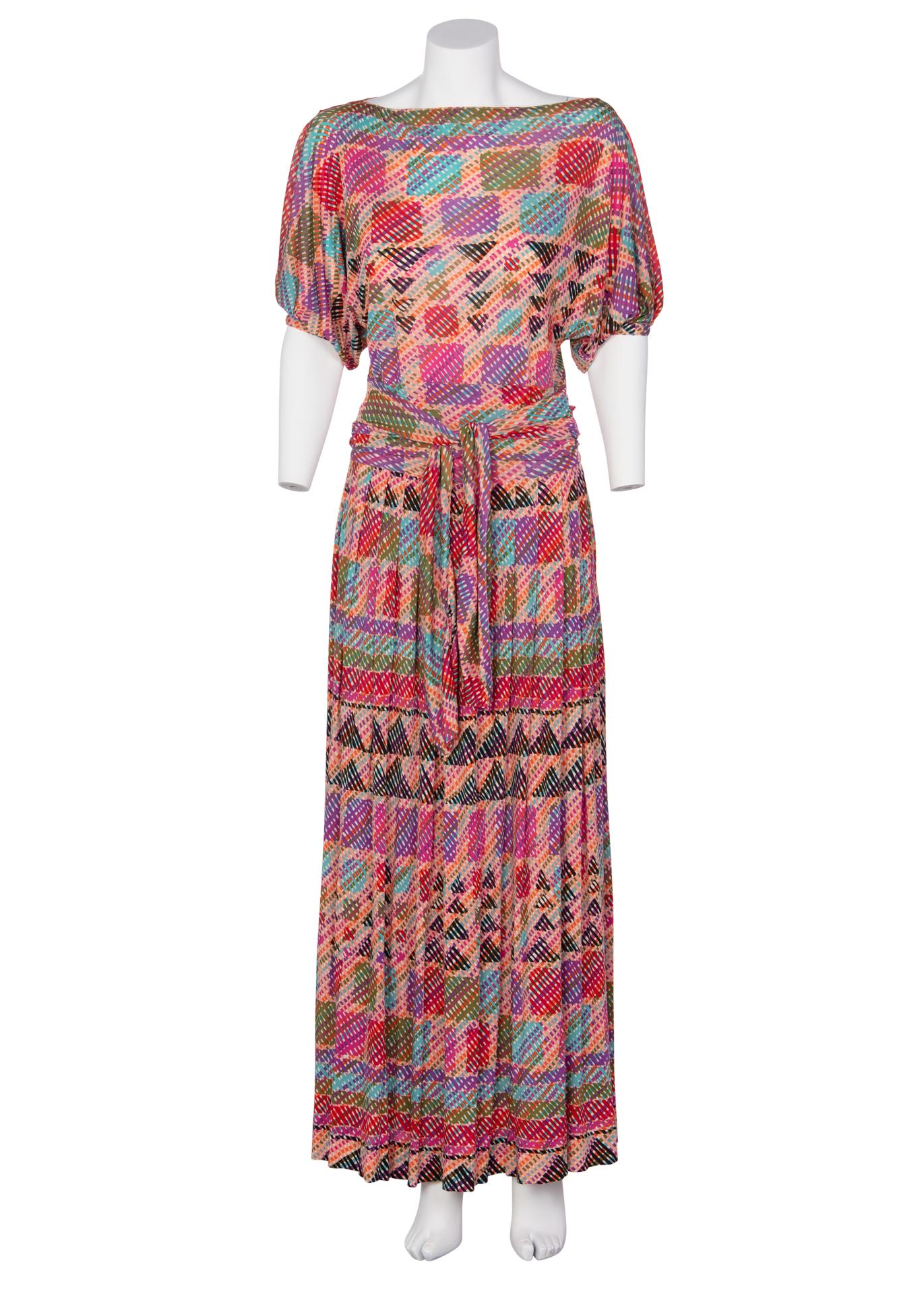 Famed for their iconic kaleidoscopic knits, Missoni crafts jersey fabric into comfortable, creative clothing. Since the conception of the brand in the 1950s, Missoni has mastered the art of pattern mixing and combinations. As with this 1970s maxi