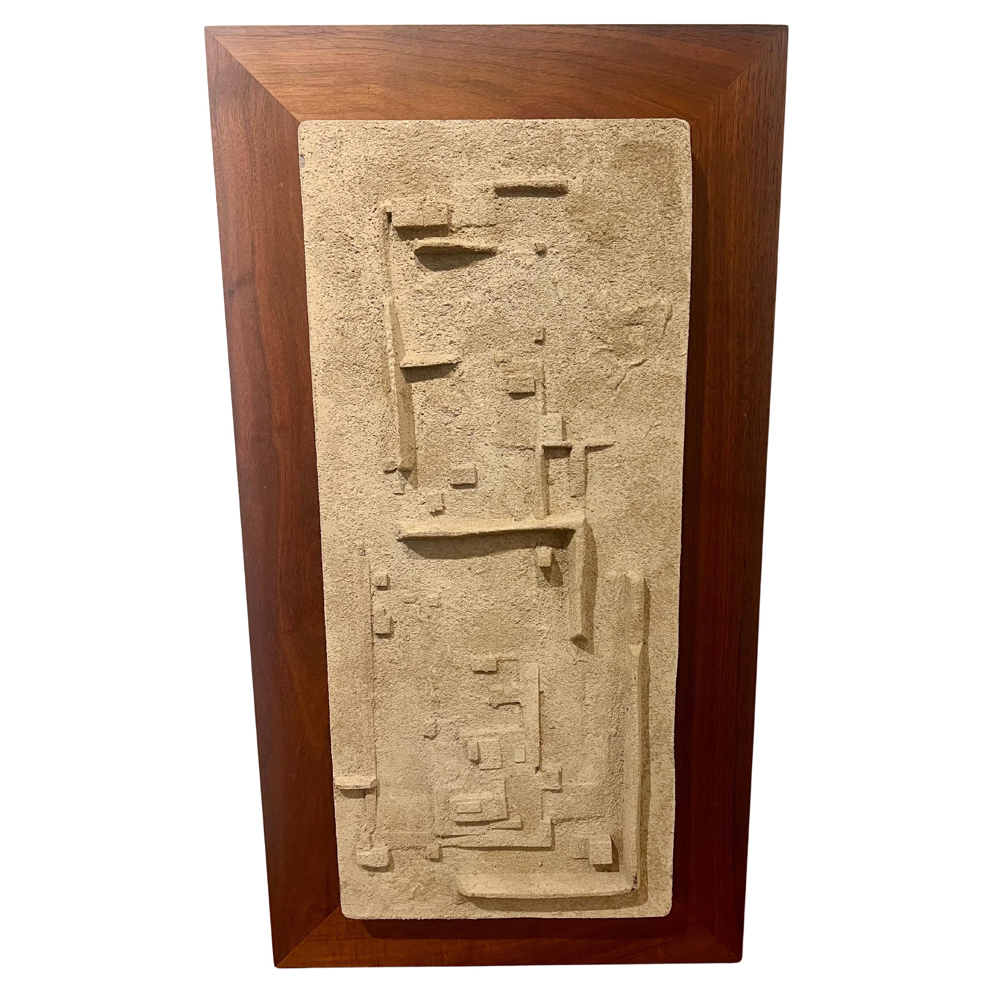 Hari Van Hoeffen, an American architect, engineer, and artist, was based in St. Louis during the mid-20th century. His work often included mixed media sculptures with abstract architectural compositions, sometimes incorporating repurposed medical