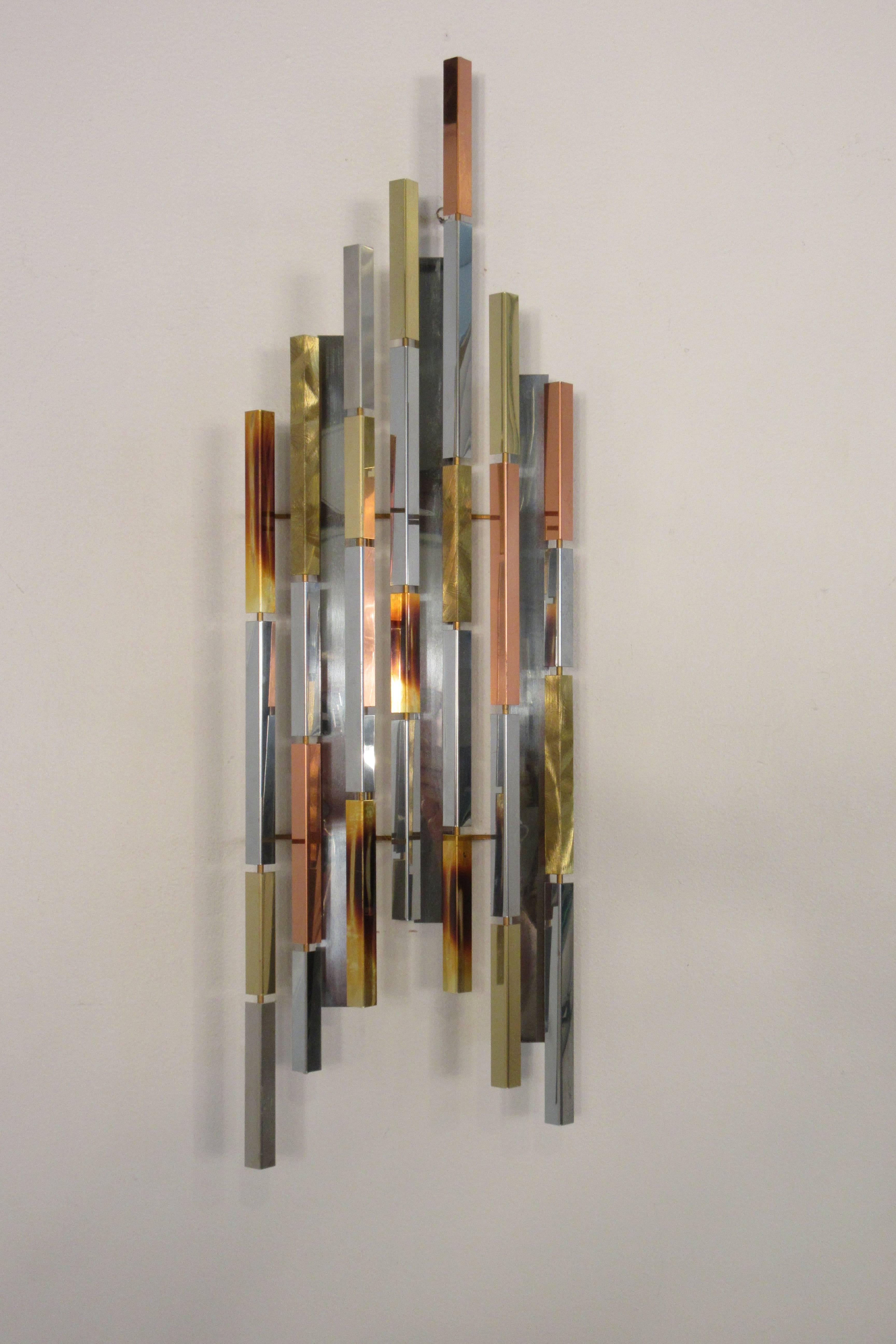 Pair of 1970s mixed metal wall sculptures . Steel,  brass, copper.