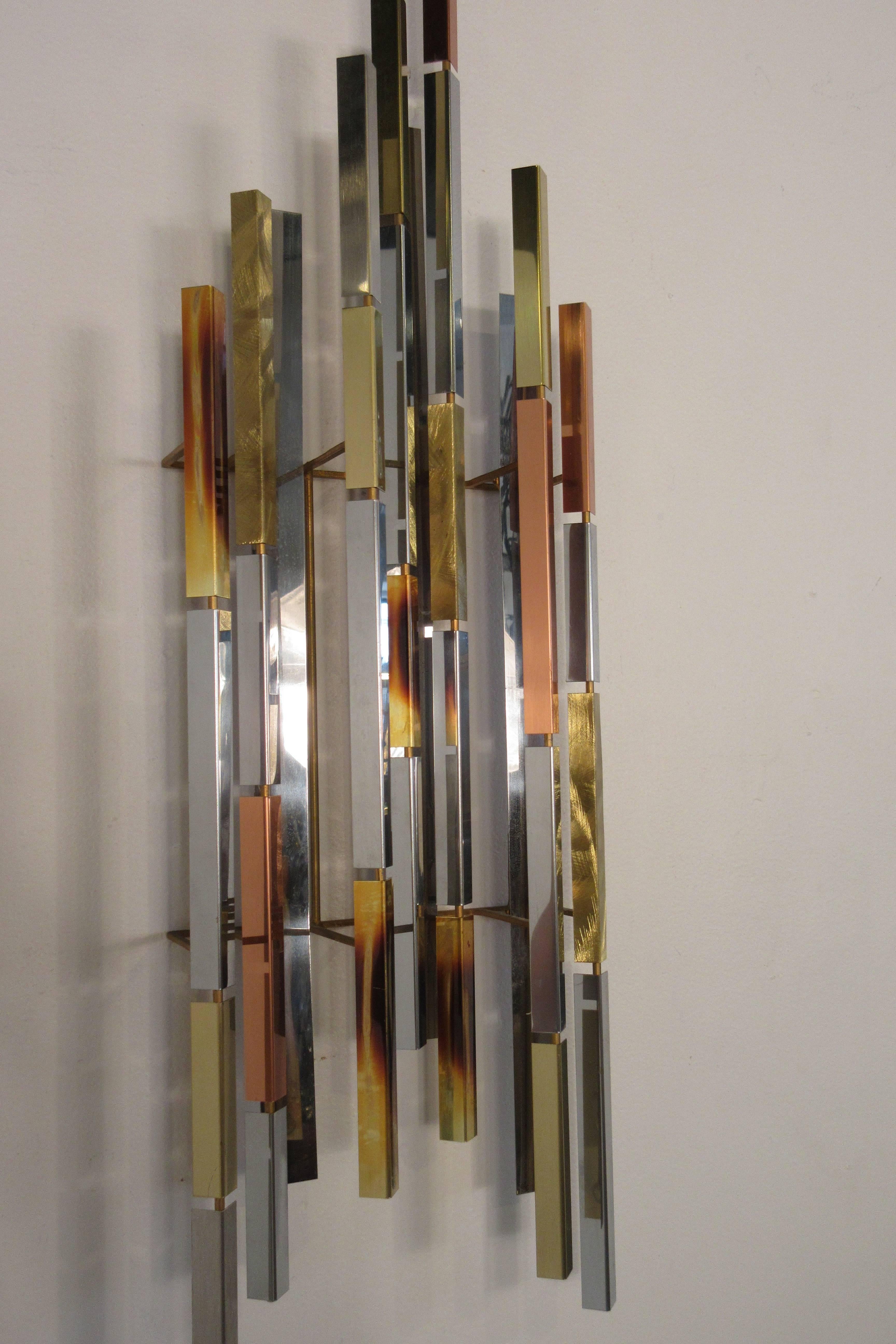 Pair Of 1970s Mixed Metal Wall Sculptures In Good Condition For Sale In Tarrytown, NY