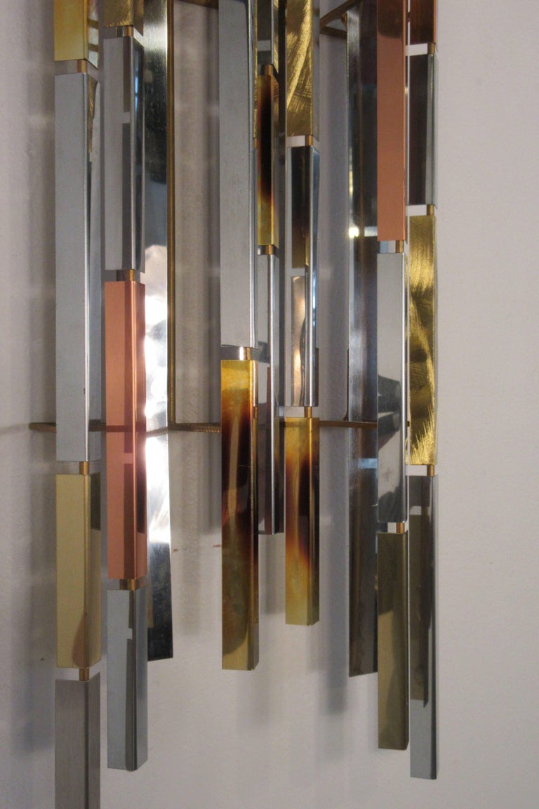 Pair Of 1970s Mixed Metal Wall Sculptures For Sale at 1stDibs