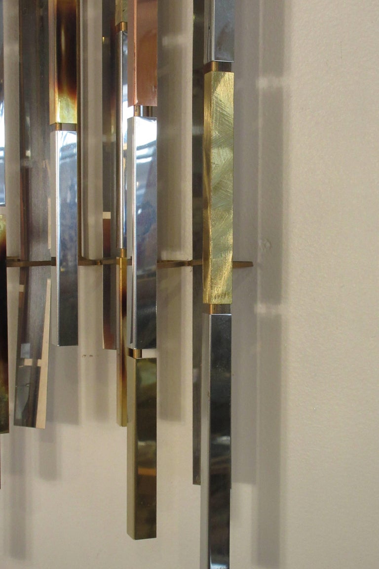 Pair Of 1970s Mixed Metal Wall Sculptures For Sale at 1stDibs