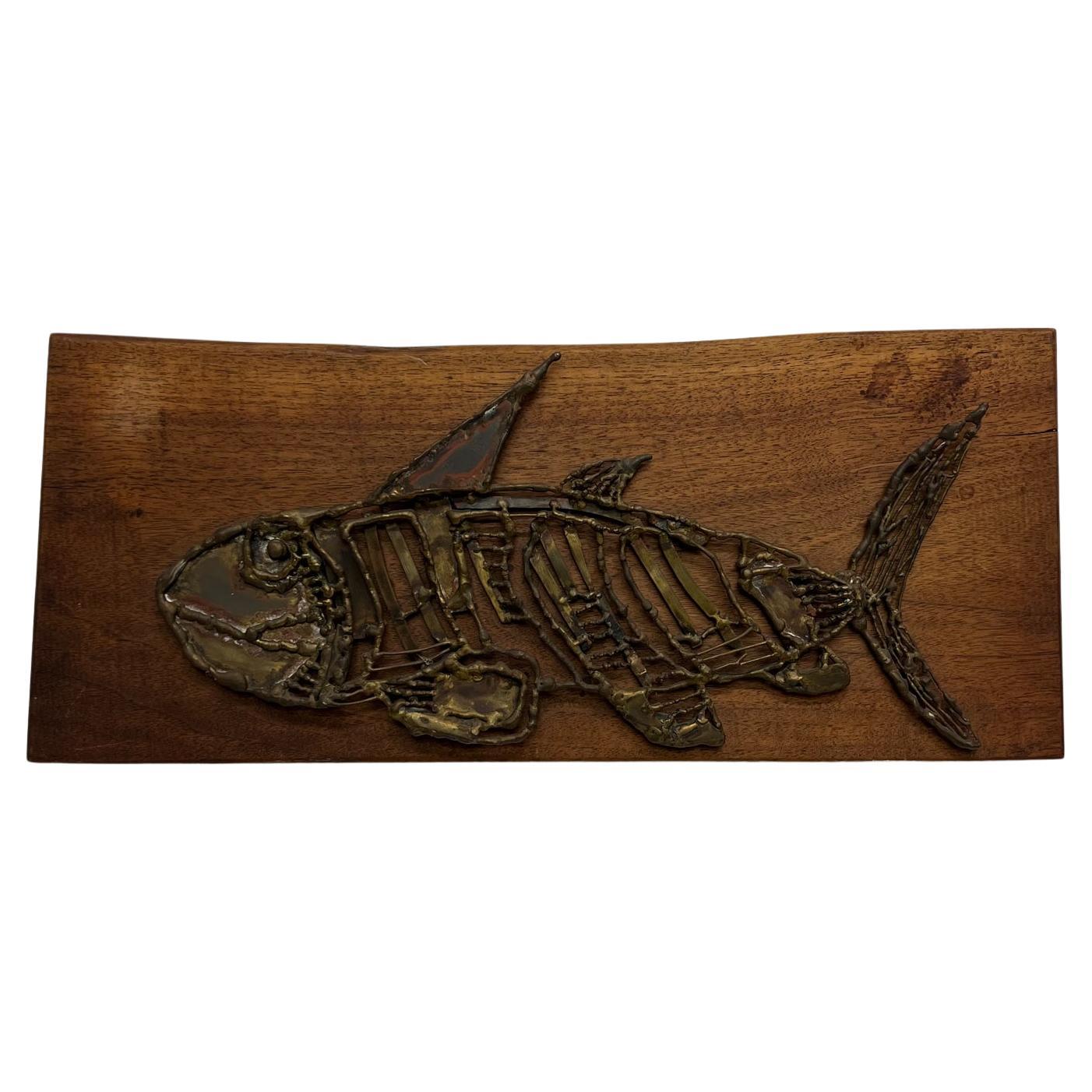 1970s Modern Brutalist wall art bronzed metal fish on wood plaque
18.5 w x 8 h x 1.5 d
Original preowned unrestored vintage condition.
See images provided please.
 