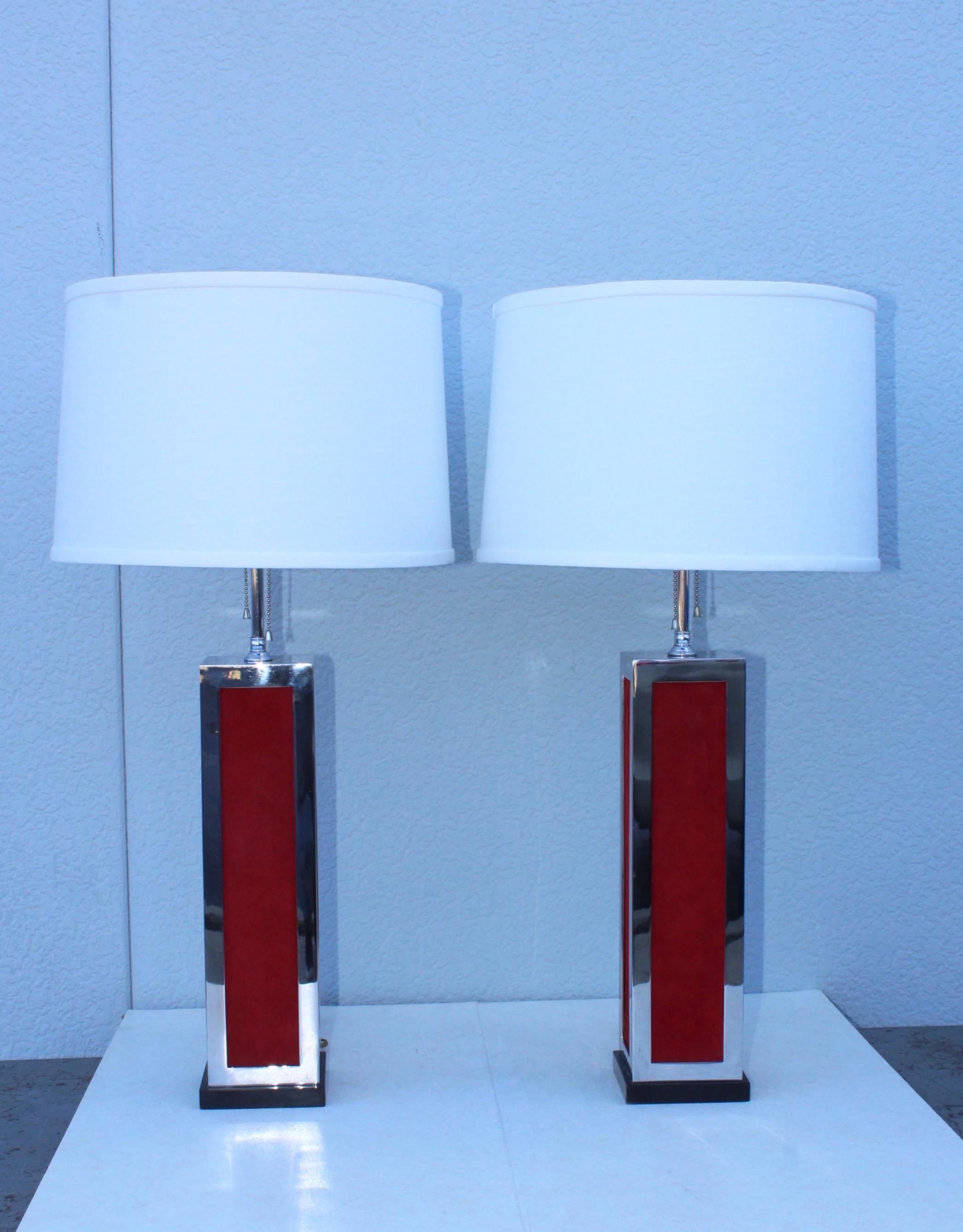Stunning pair of 1970s modern well made chrome and red velvet table lamps.

Shades for photography only.