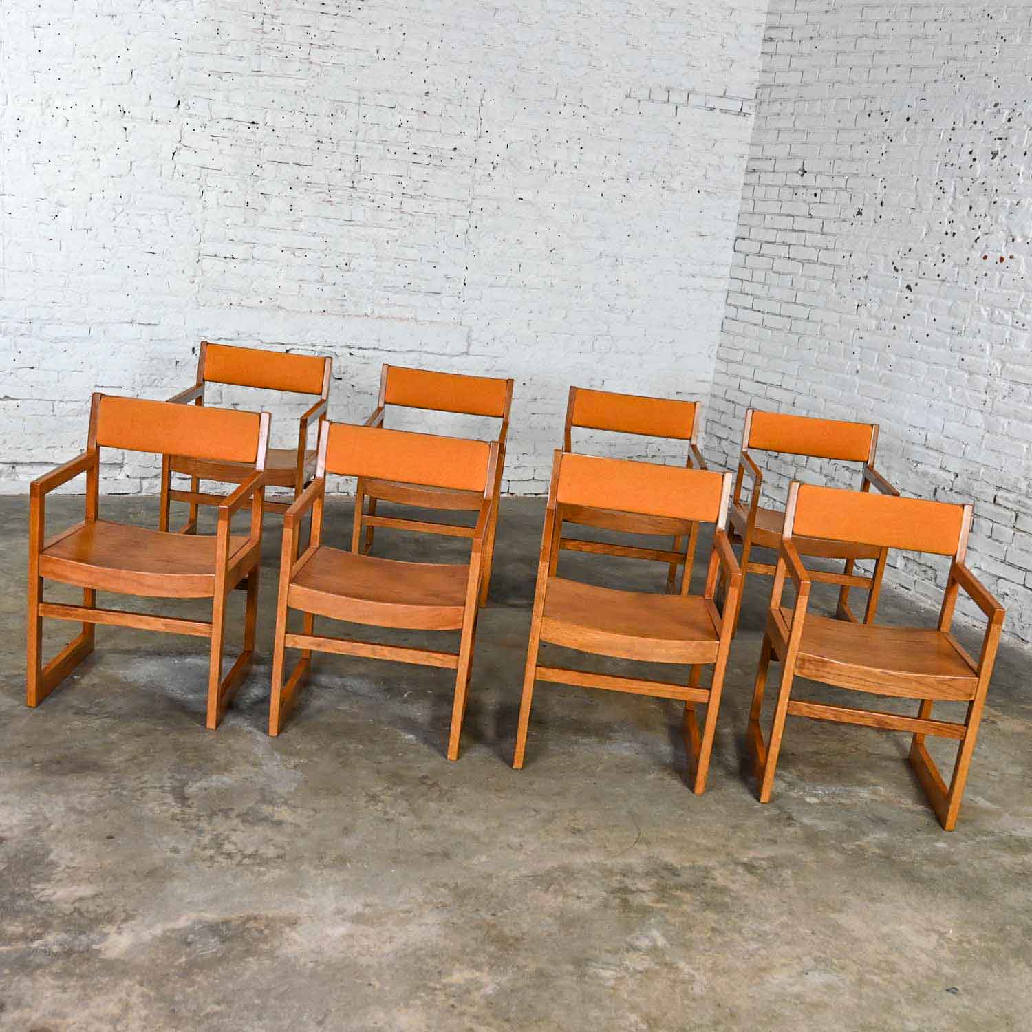 Fabulous vintage Modern Jasper Chair Company comprised of oak frames, golden orange tweed hopsacking fabric seat backs, bentwood seats, and sleigh style bases, a set of 8. Beautiful condition, keeping in mind that these are vintage and not new so