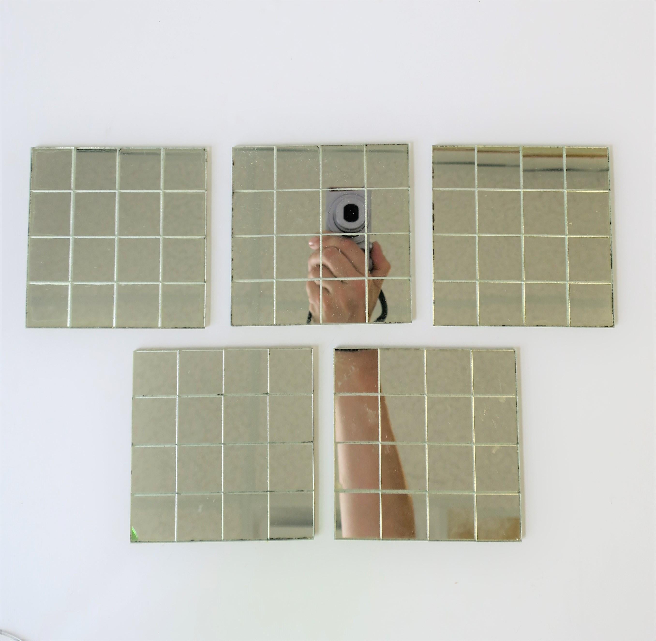 A set of five 1970s modern 'disco ball' mirrored glass coaster set. In original box. 

East coaster measures: 3.88 in. square.